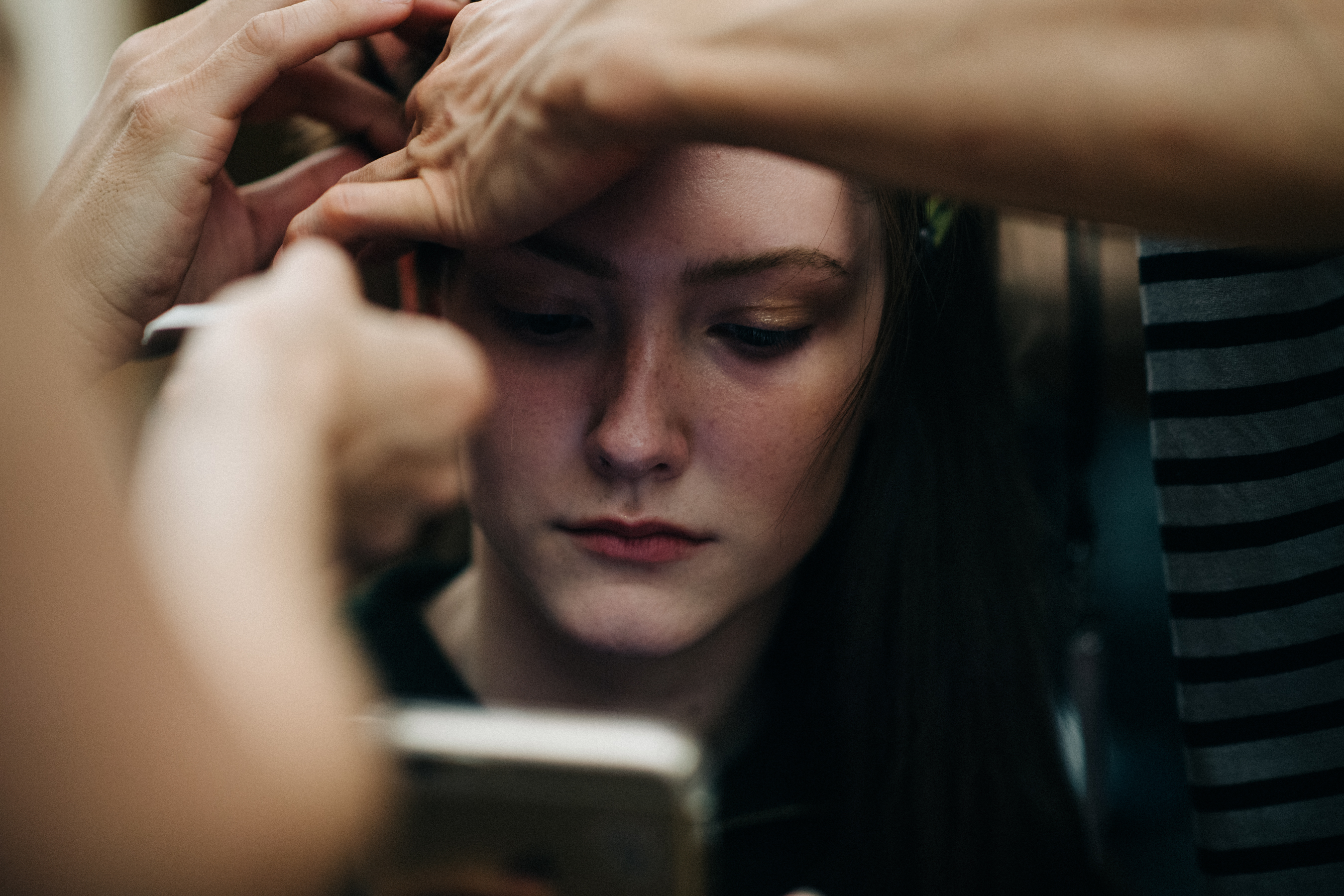 Model Allyson Chalmers getting make up done
