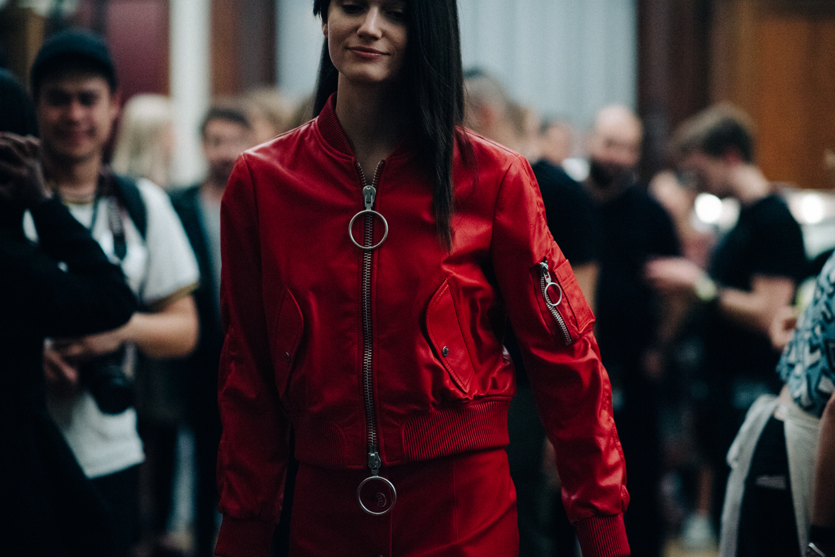 Model wearing all red jacket