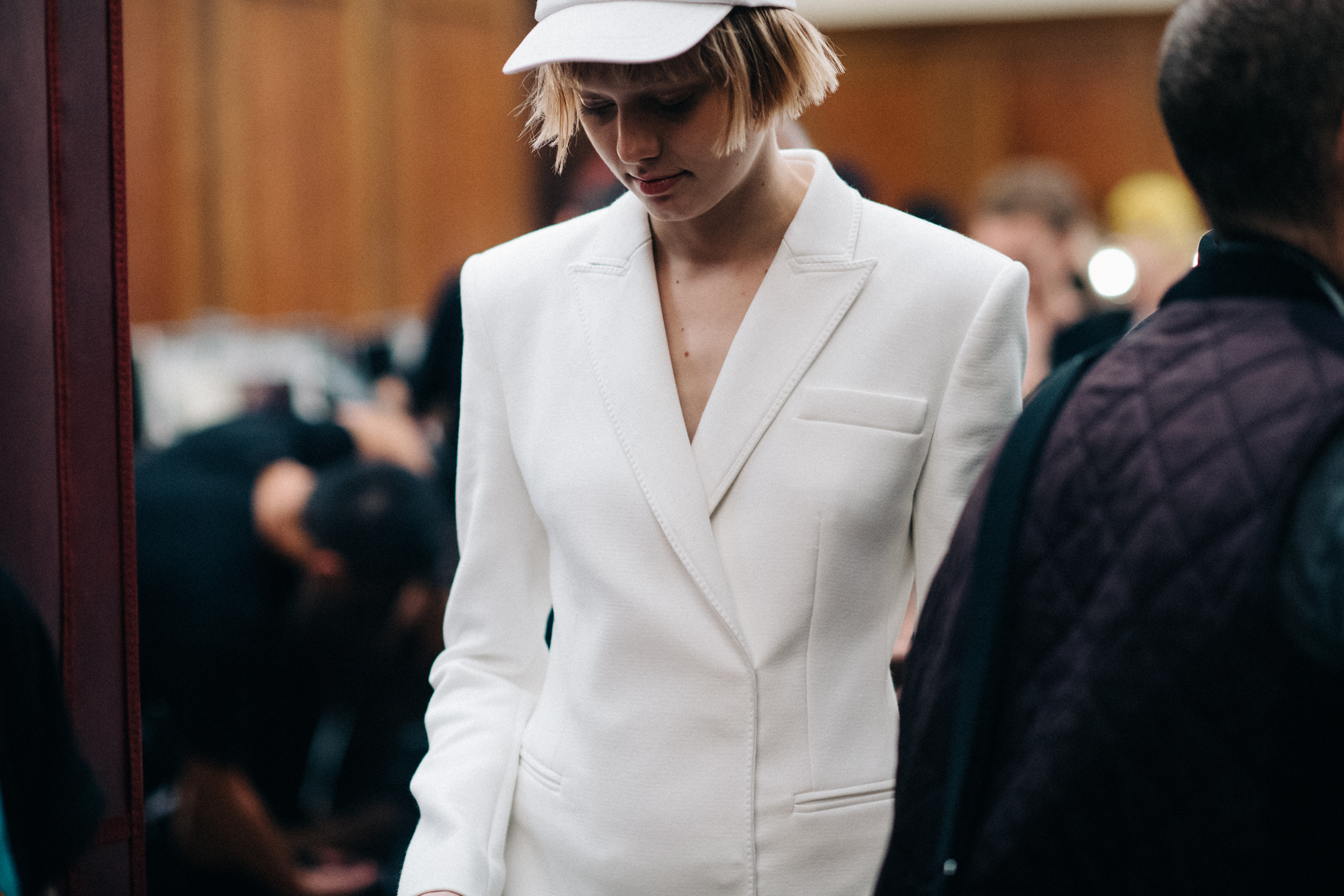 Model Katherine Moore wearing white outfit