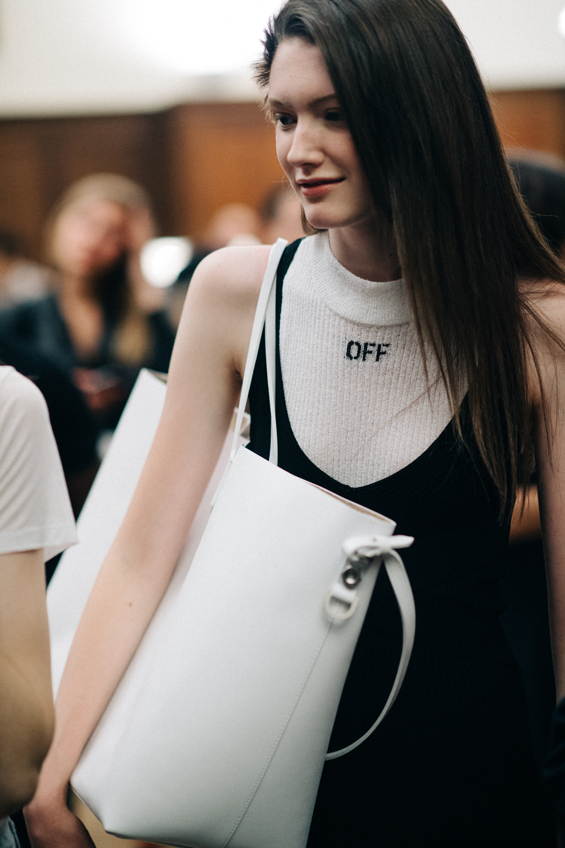 Model Allyson Chalmers with white bag