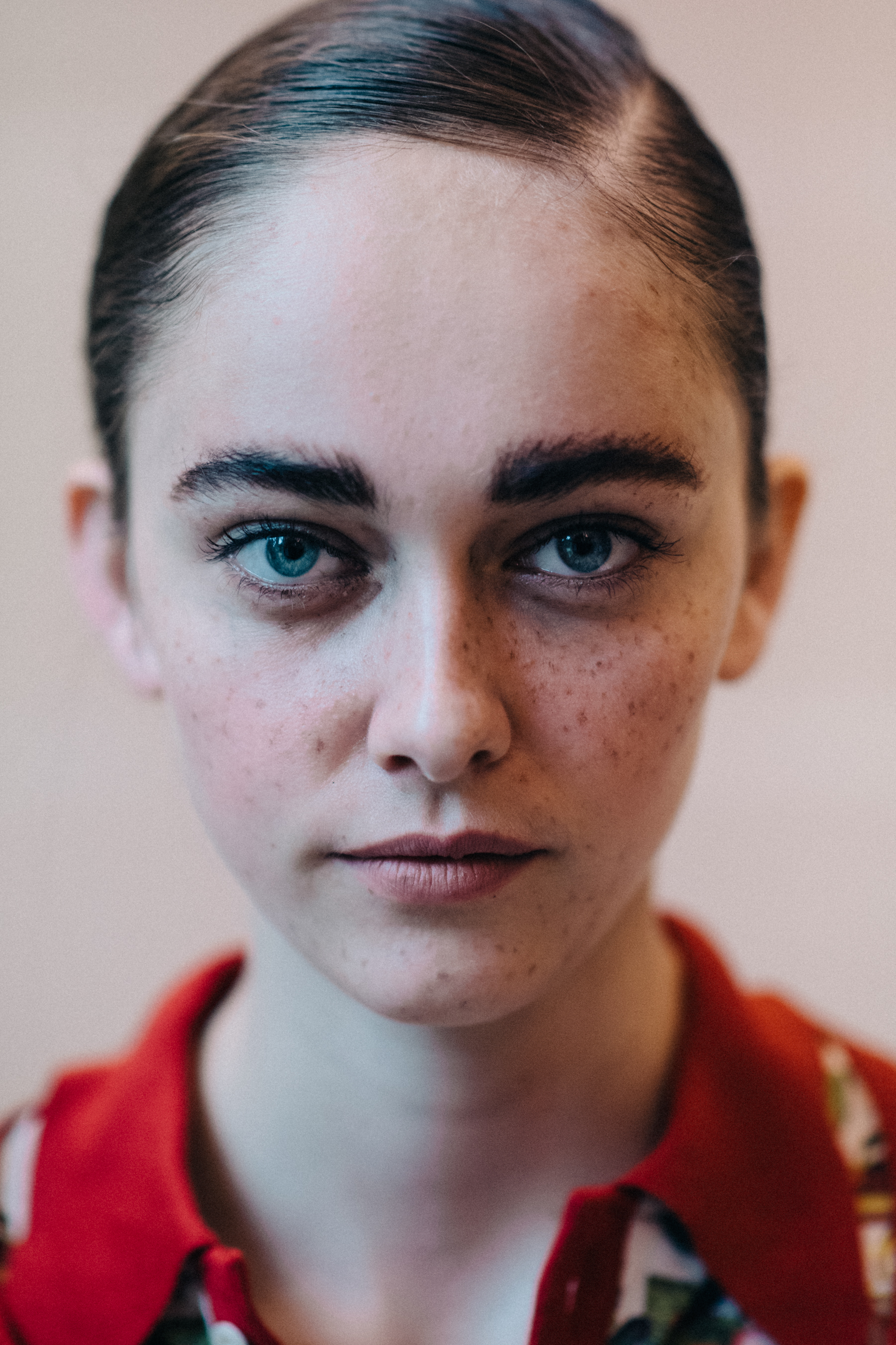 Portrait of a model with freckles make up