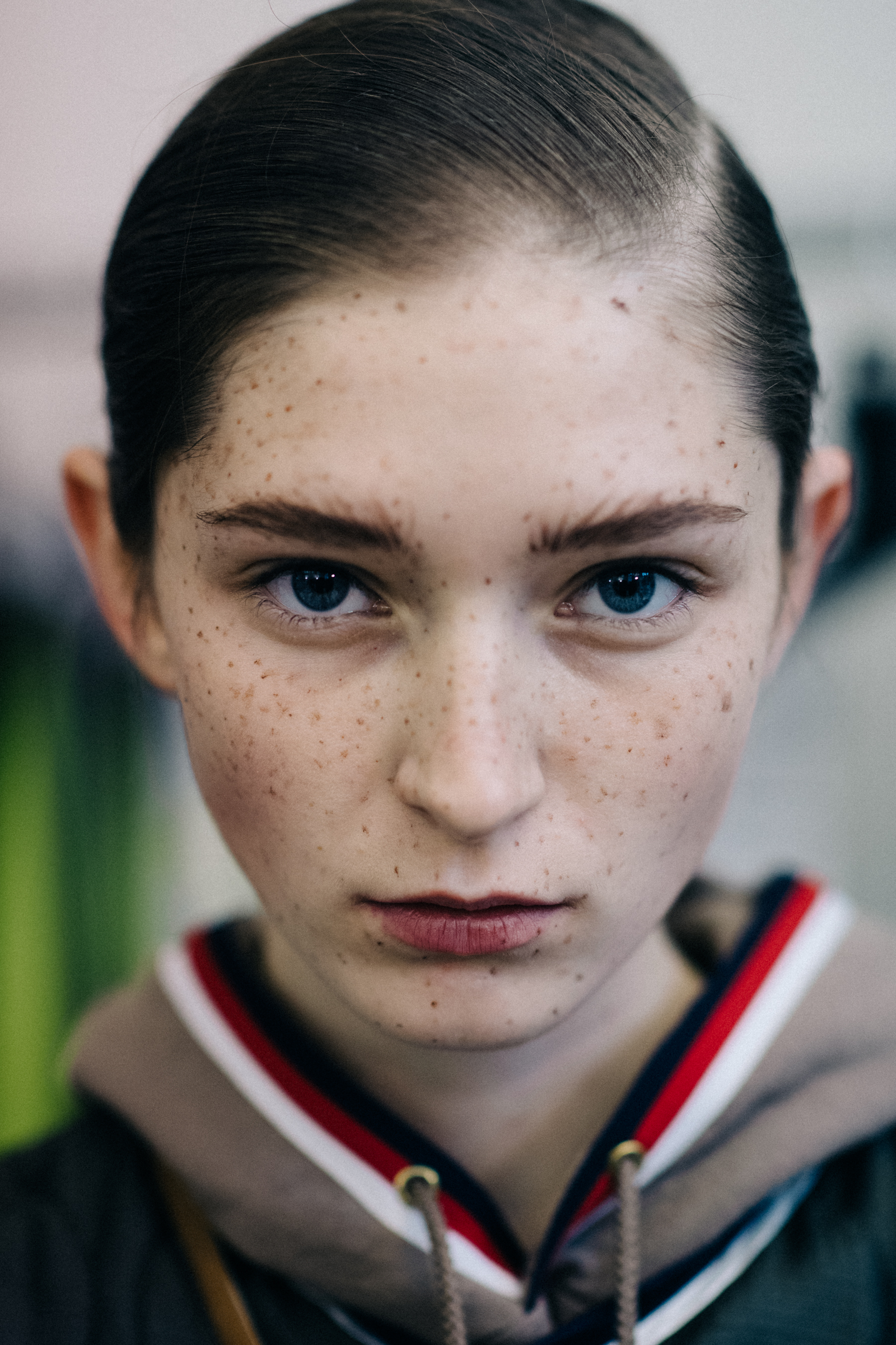 Portrait of a model with freckles make up