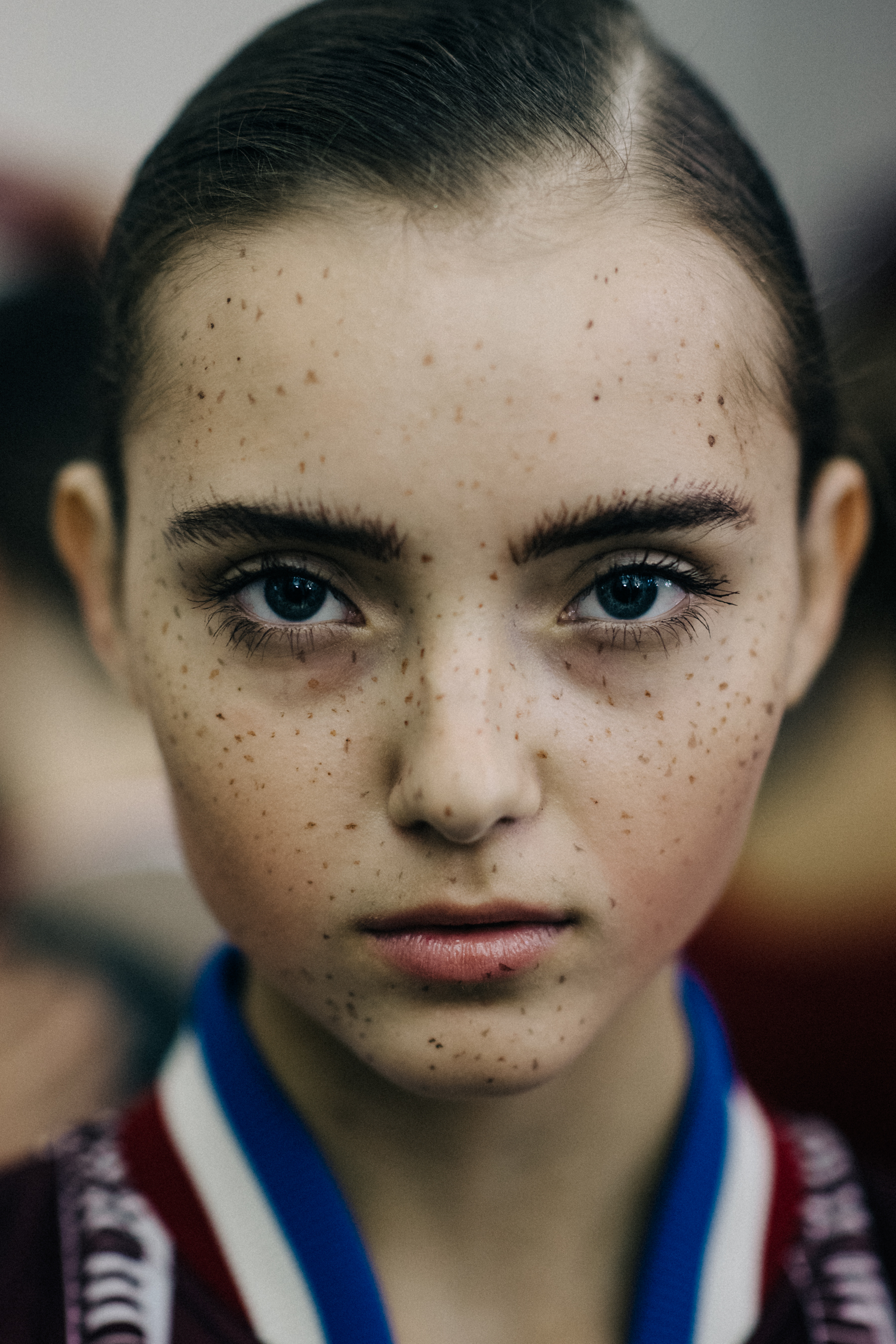 Portrait of a model with freckles make up