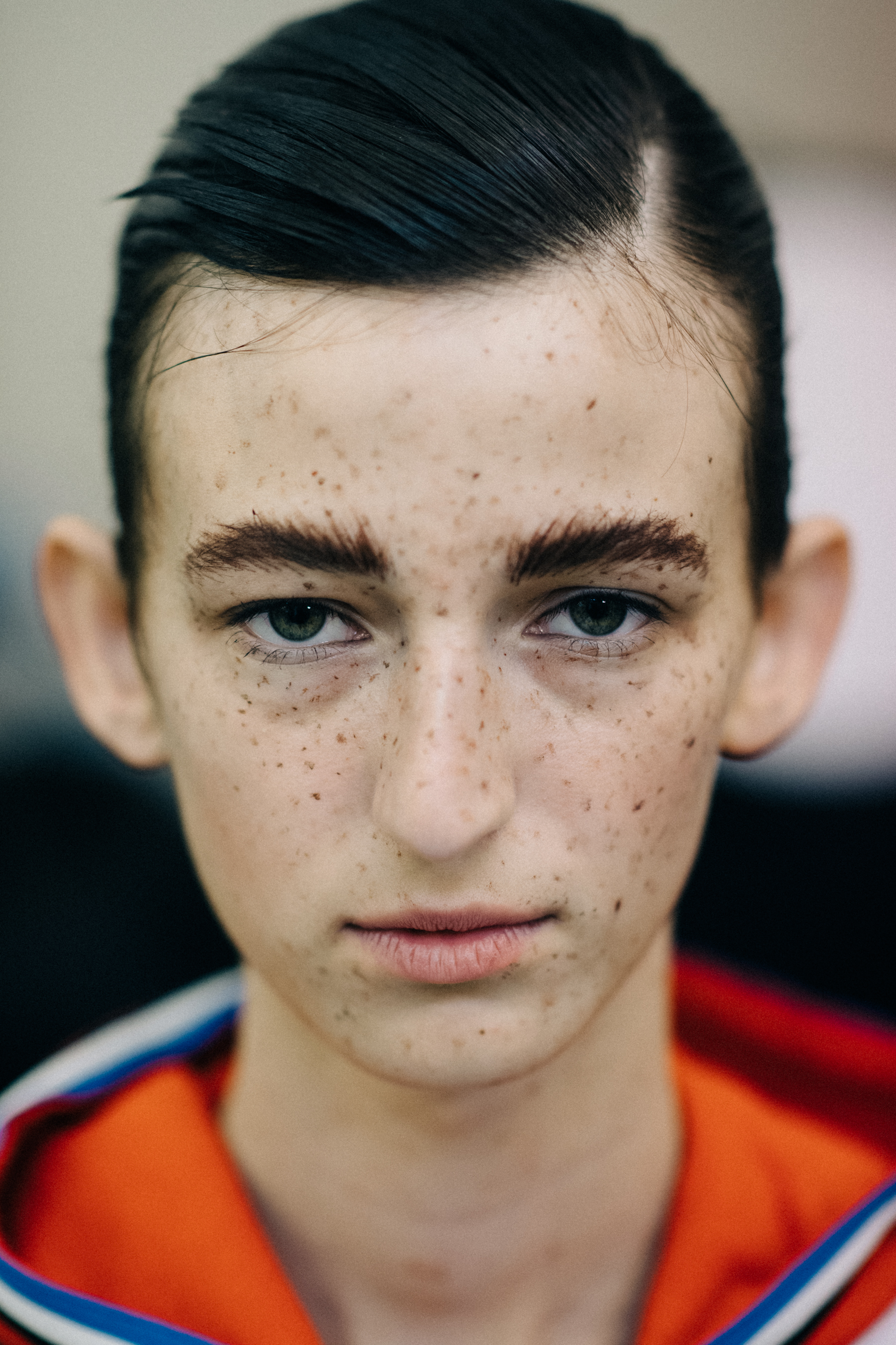 Portrait of a model with freckles make up