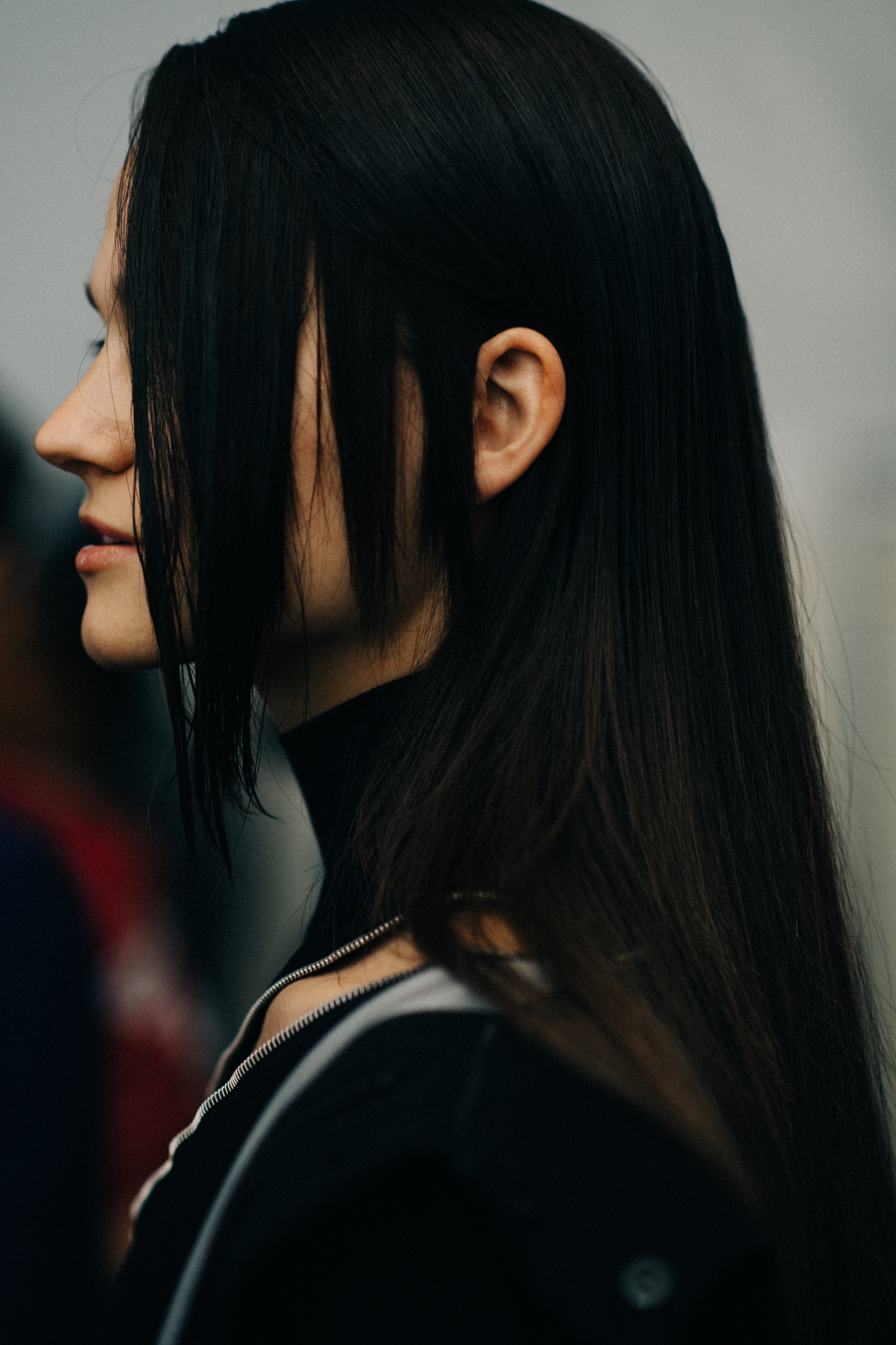 Model with black hair before the show