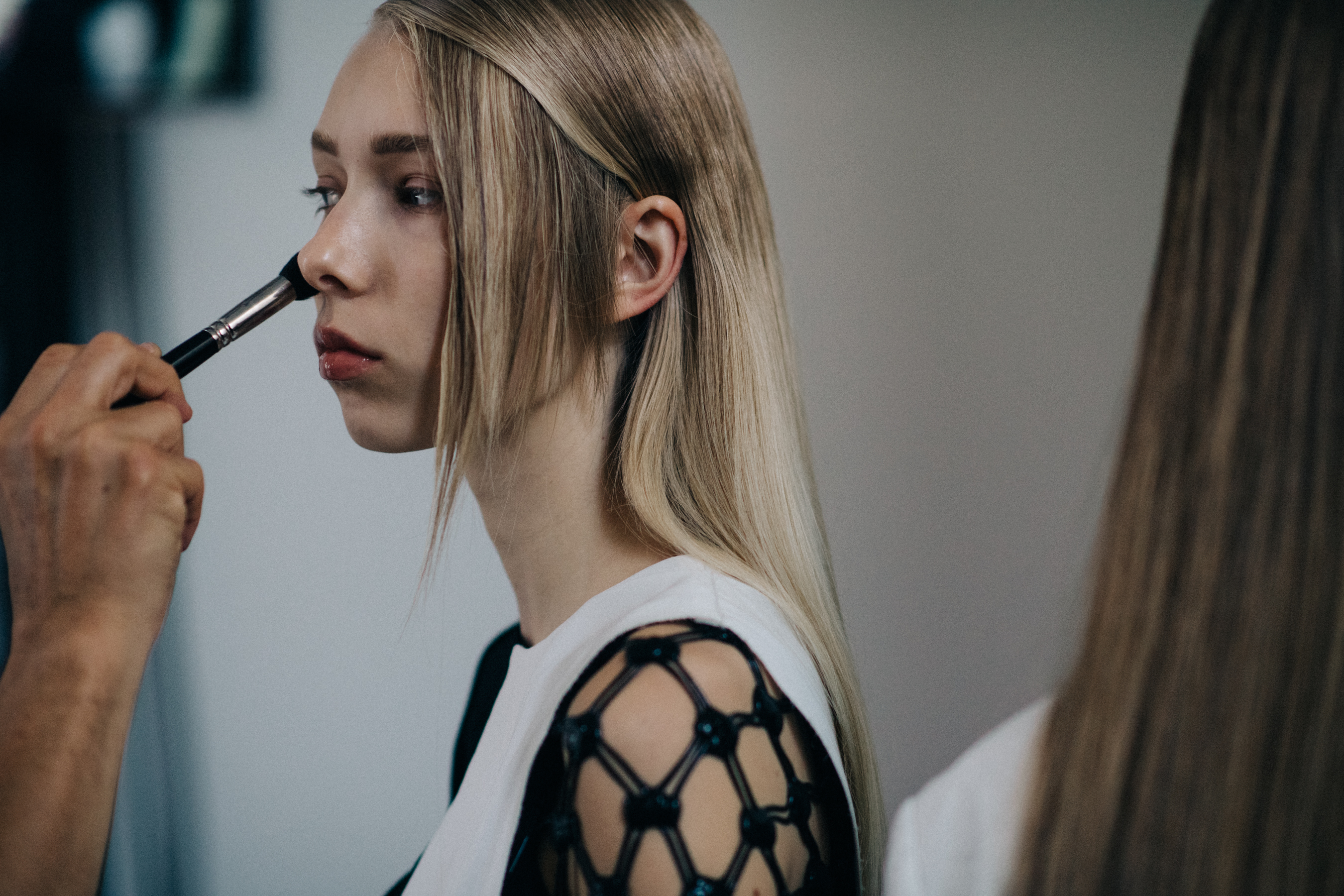Model getting make up done