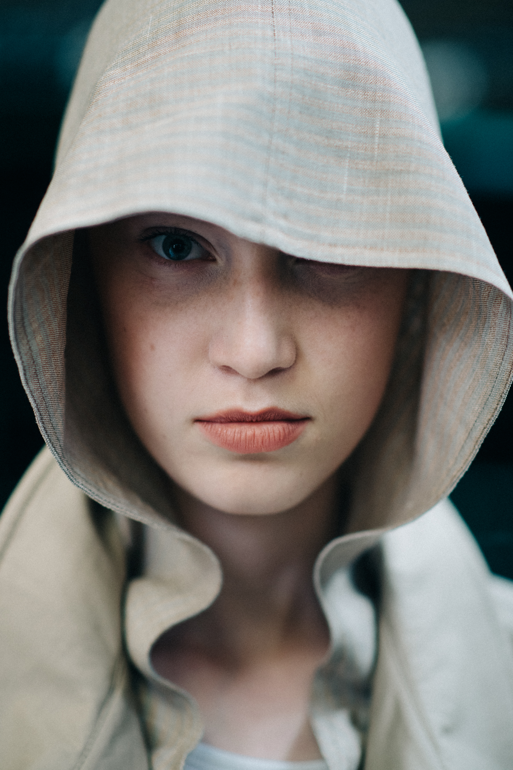 Portrait of female model wearing hood
