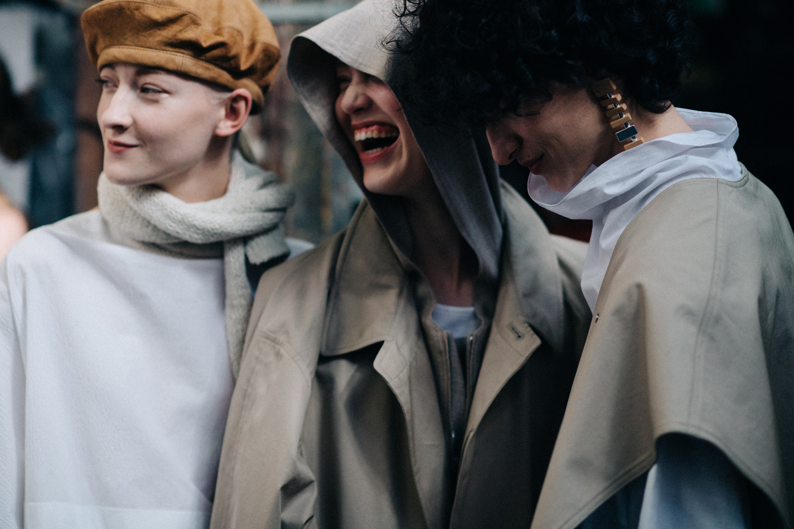 Three laughing female models