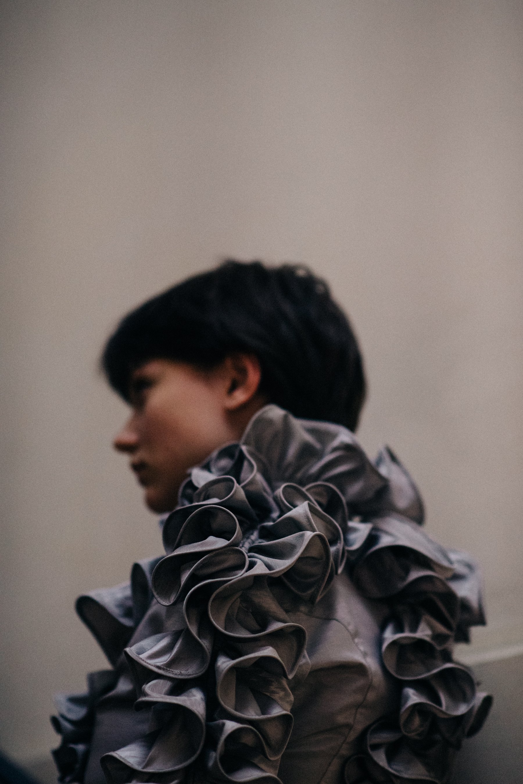 Model with ruffle shirt