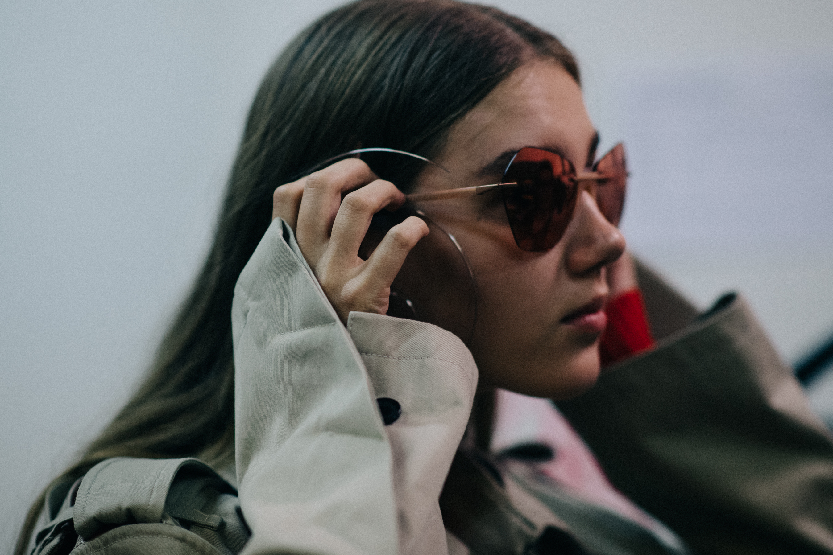 Model wearing red sunglasses