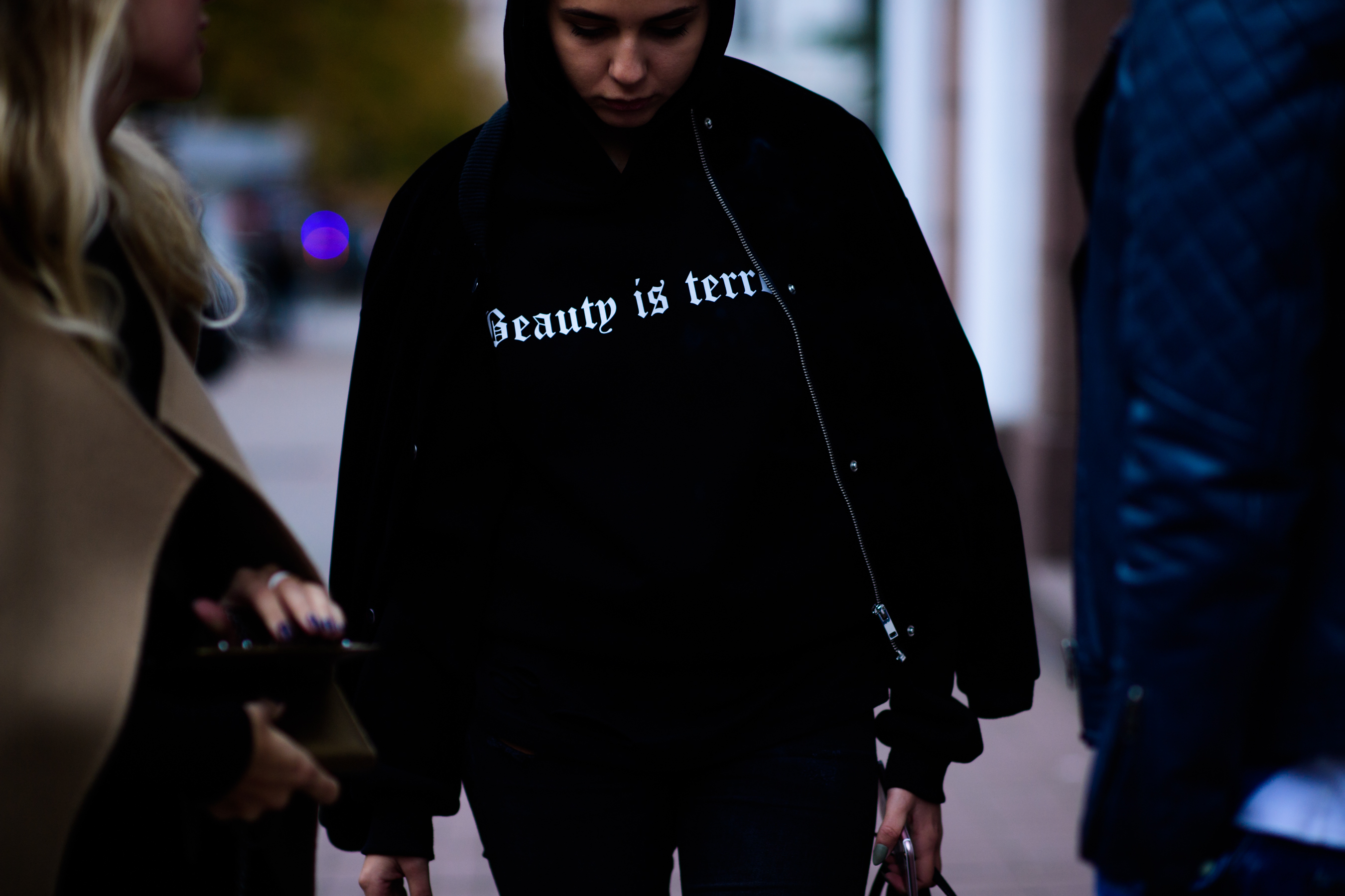 Girl wearing black sweatshirt
