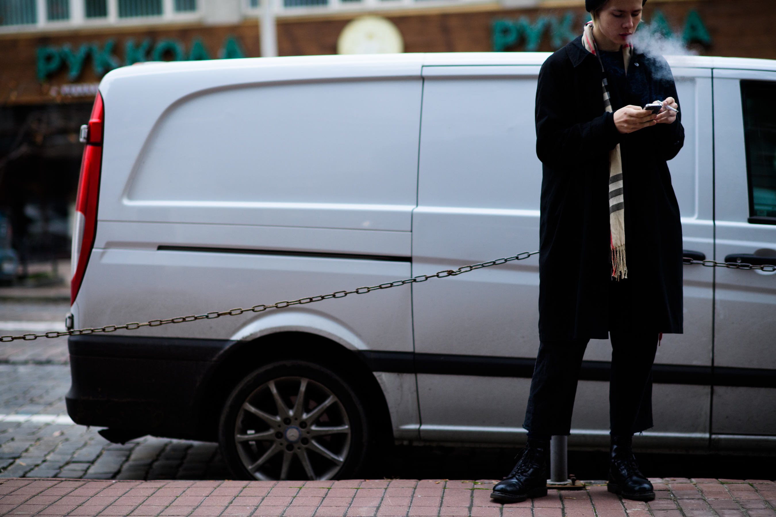 Boy wearing Burberry style scarf