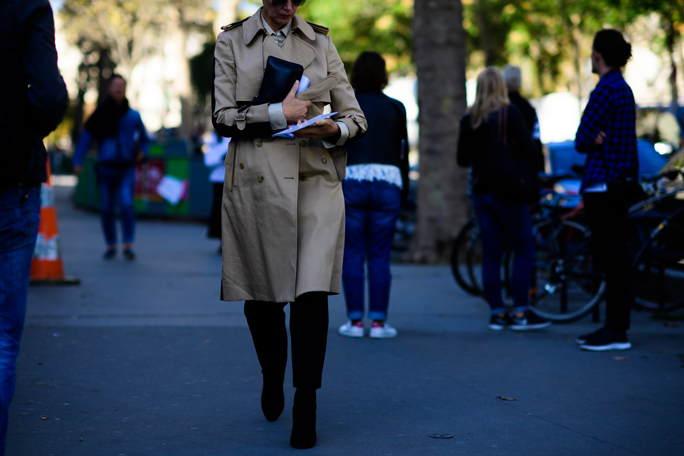 German journalist in camel trench coat