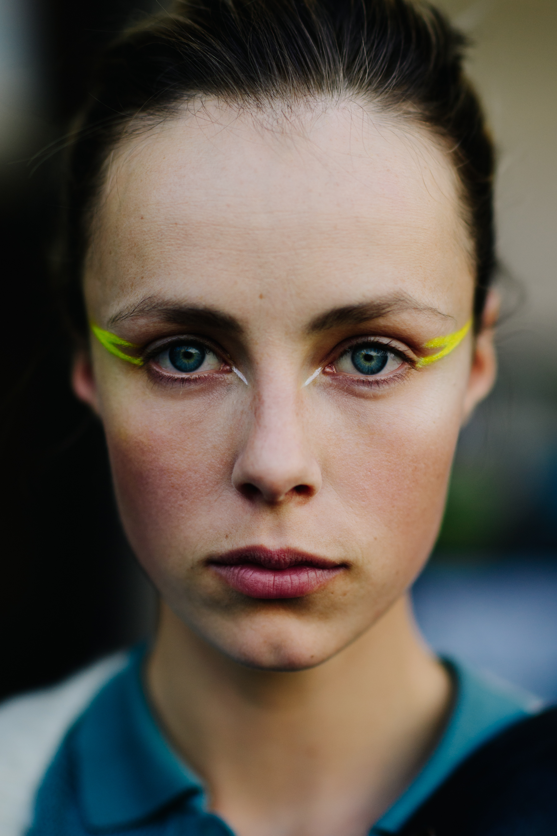 Portrait of English model with yellow eye makeup