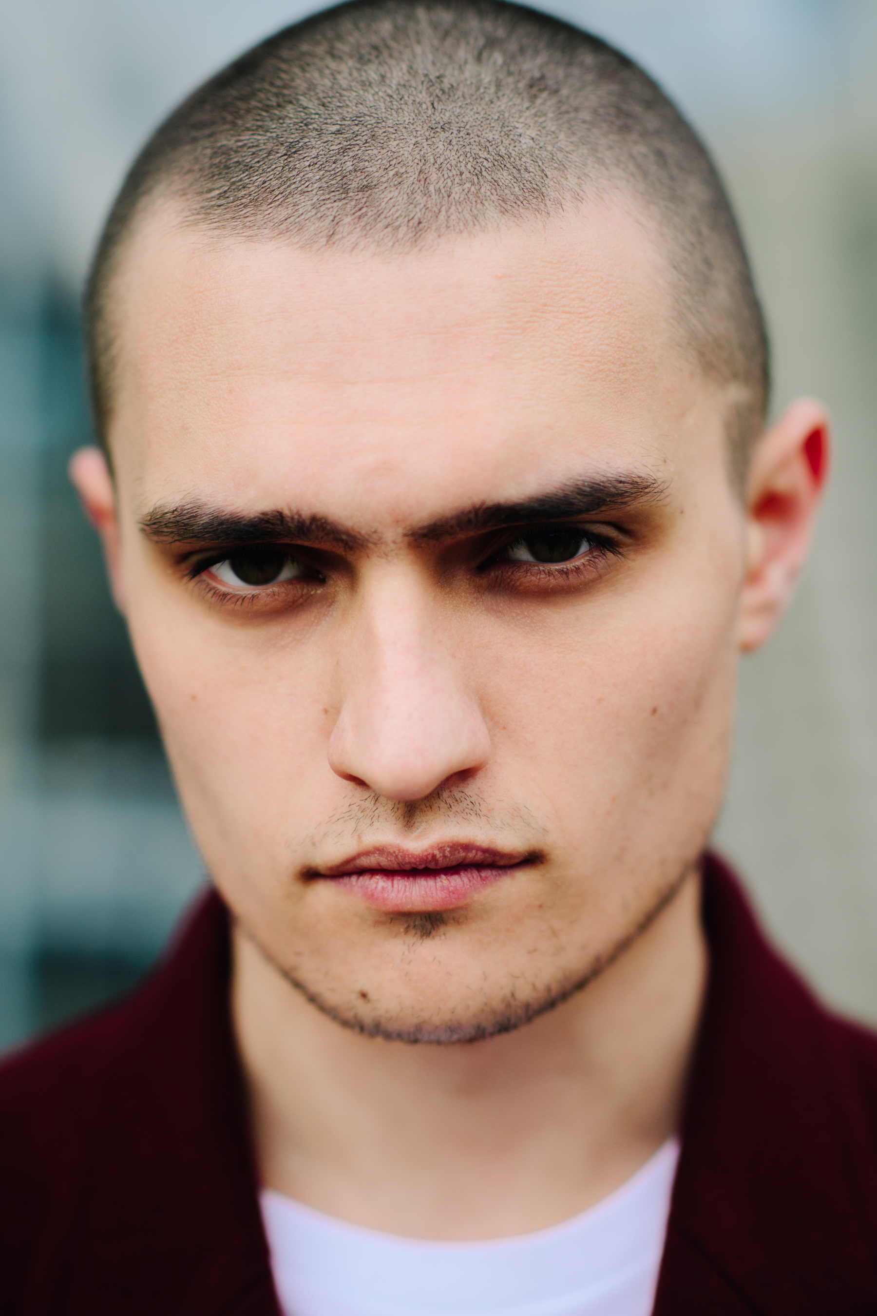 Portrait of a male model with shaved head