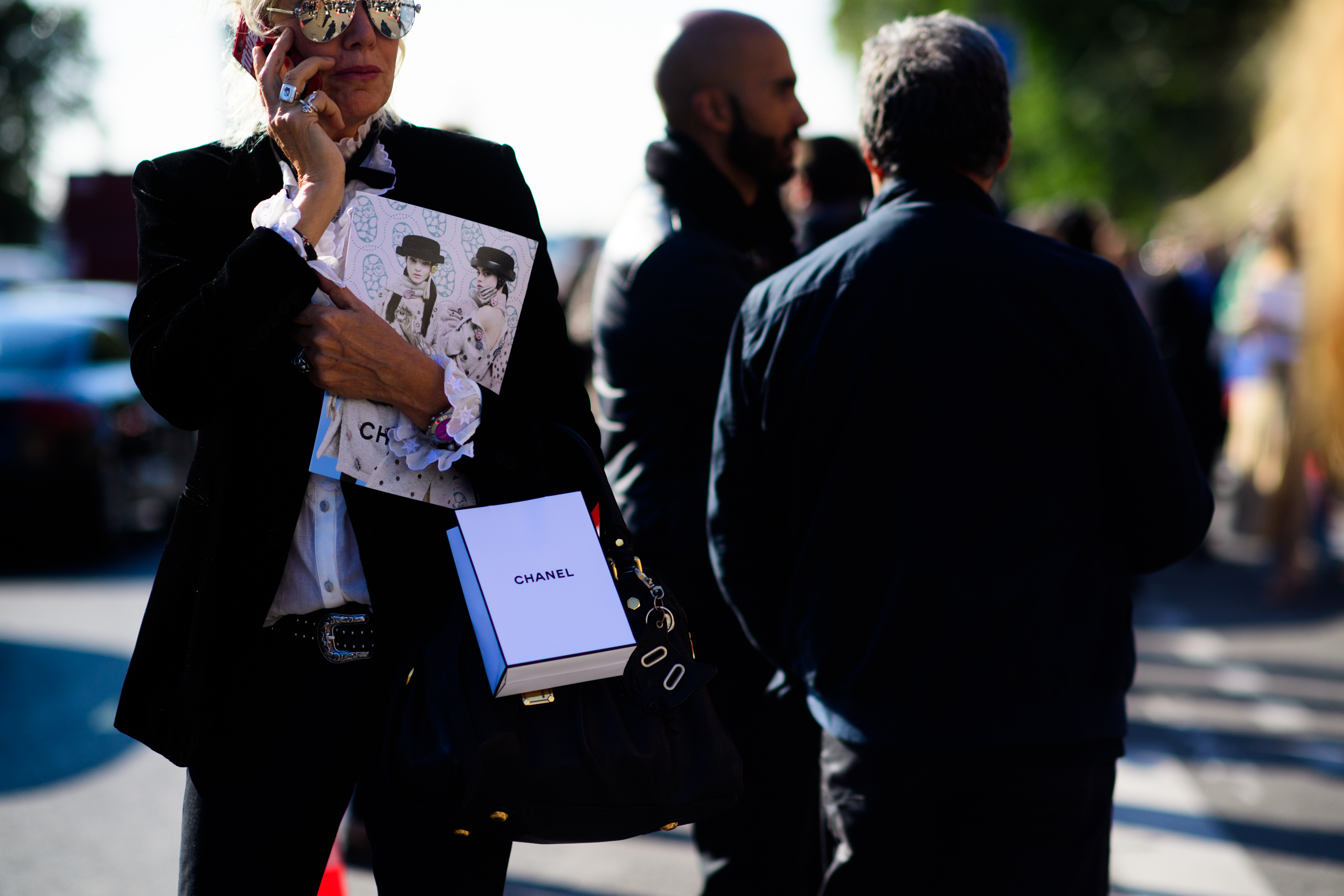 Photographer wearing silver sunglasses