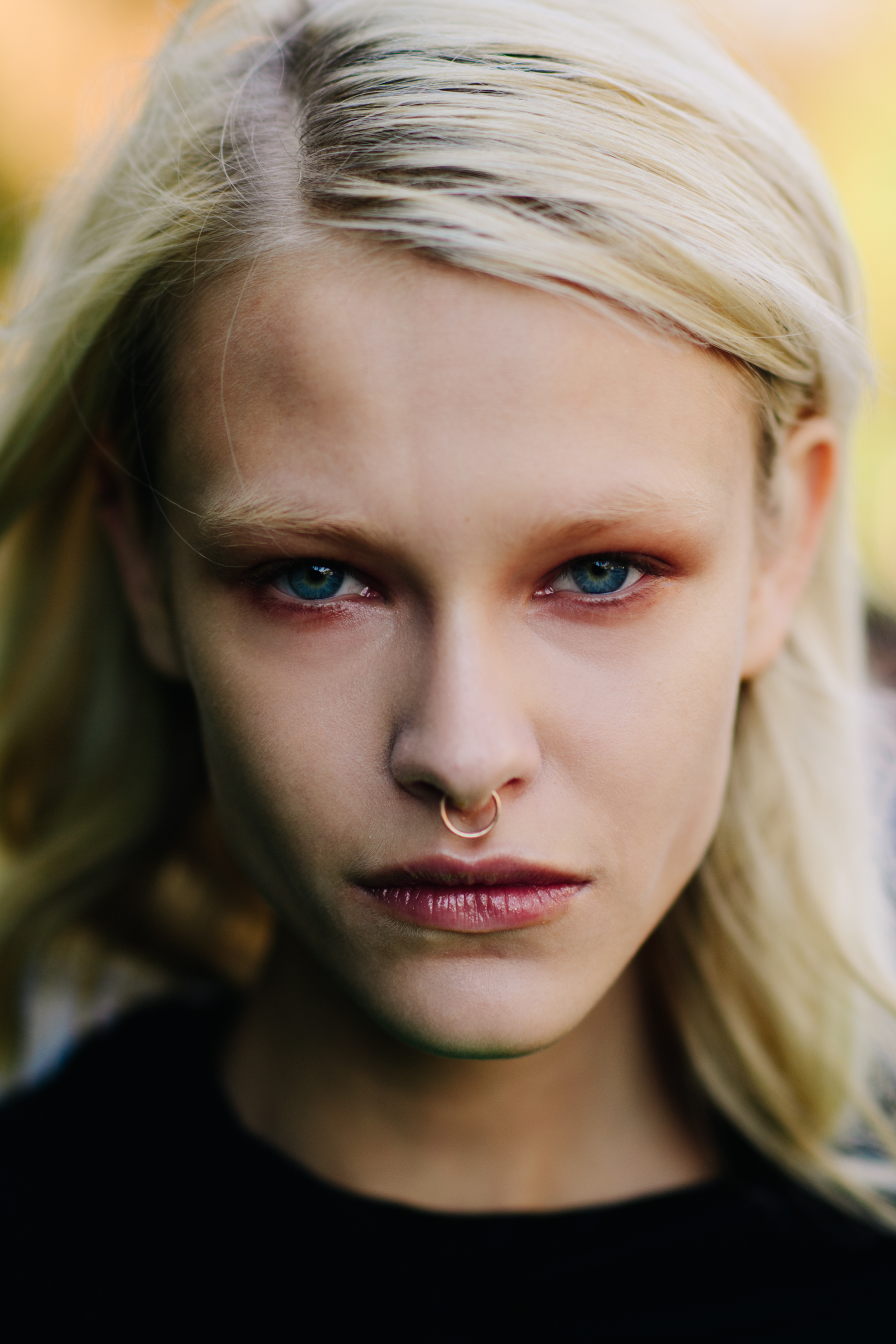 Portrait of model with blonde hair and blue eyes