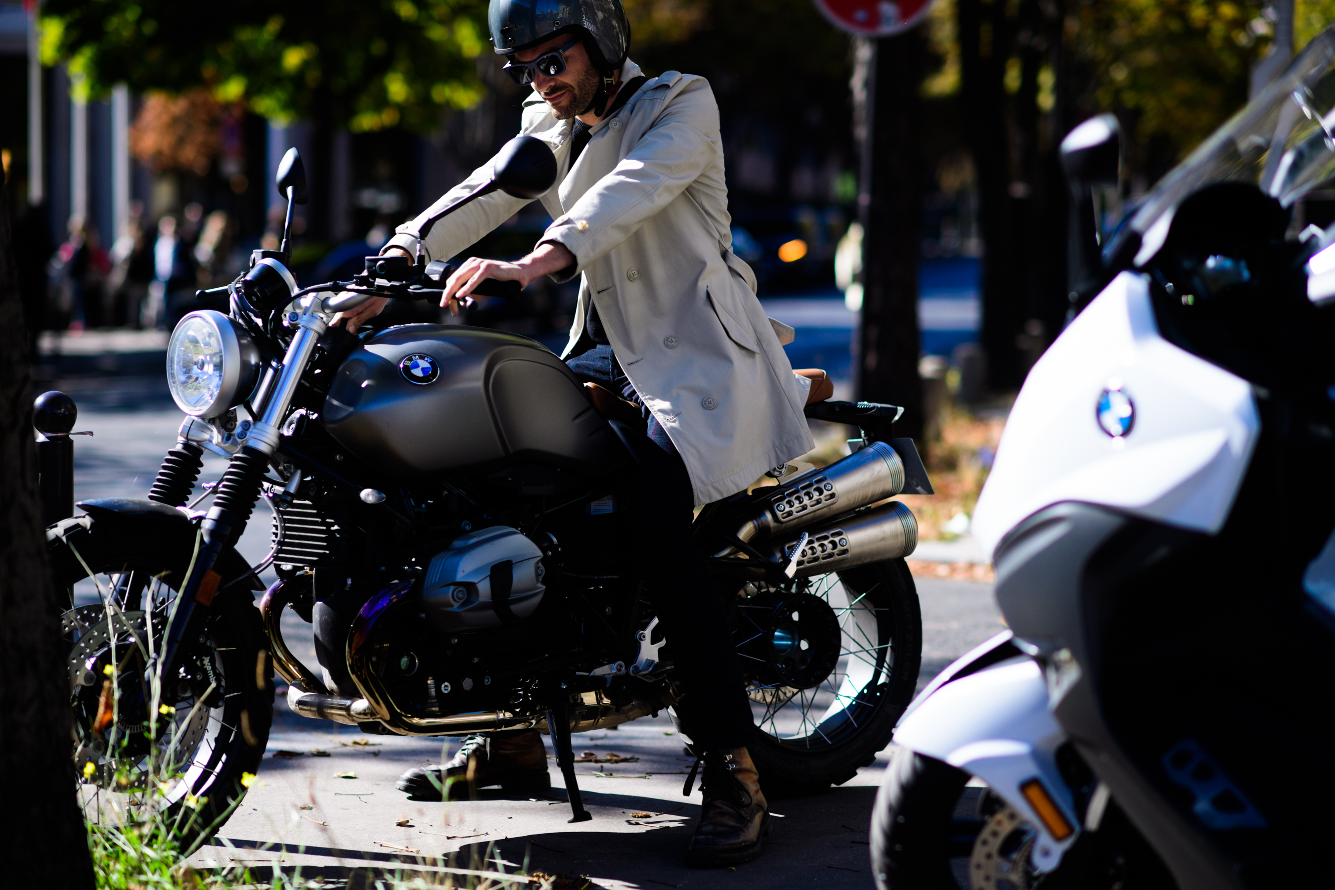 Photographer sitting on motorcycle
