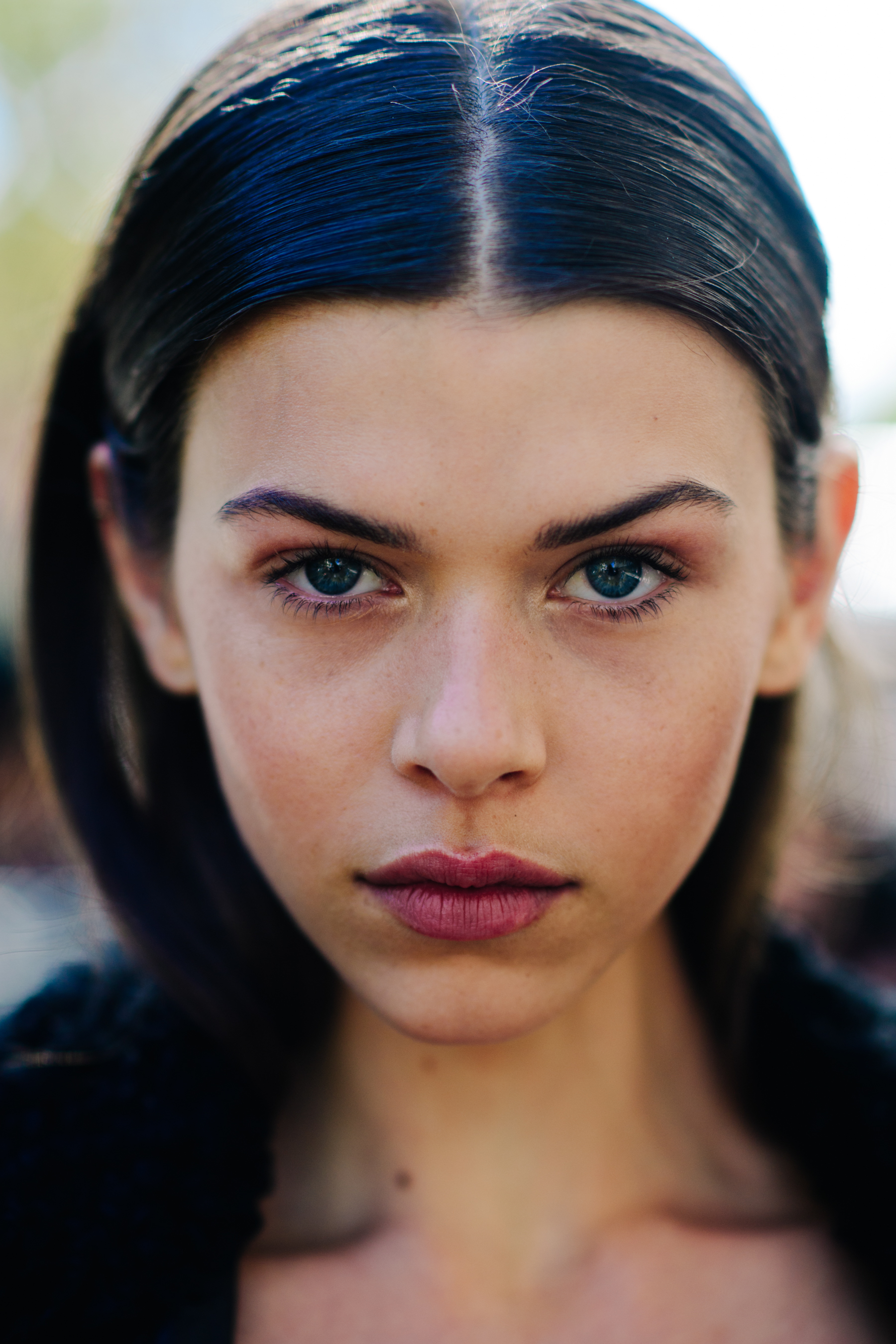 Portrait of model with blue eyes and wet hair