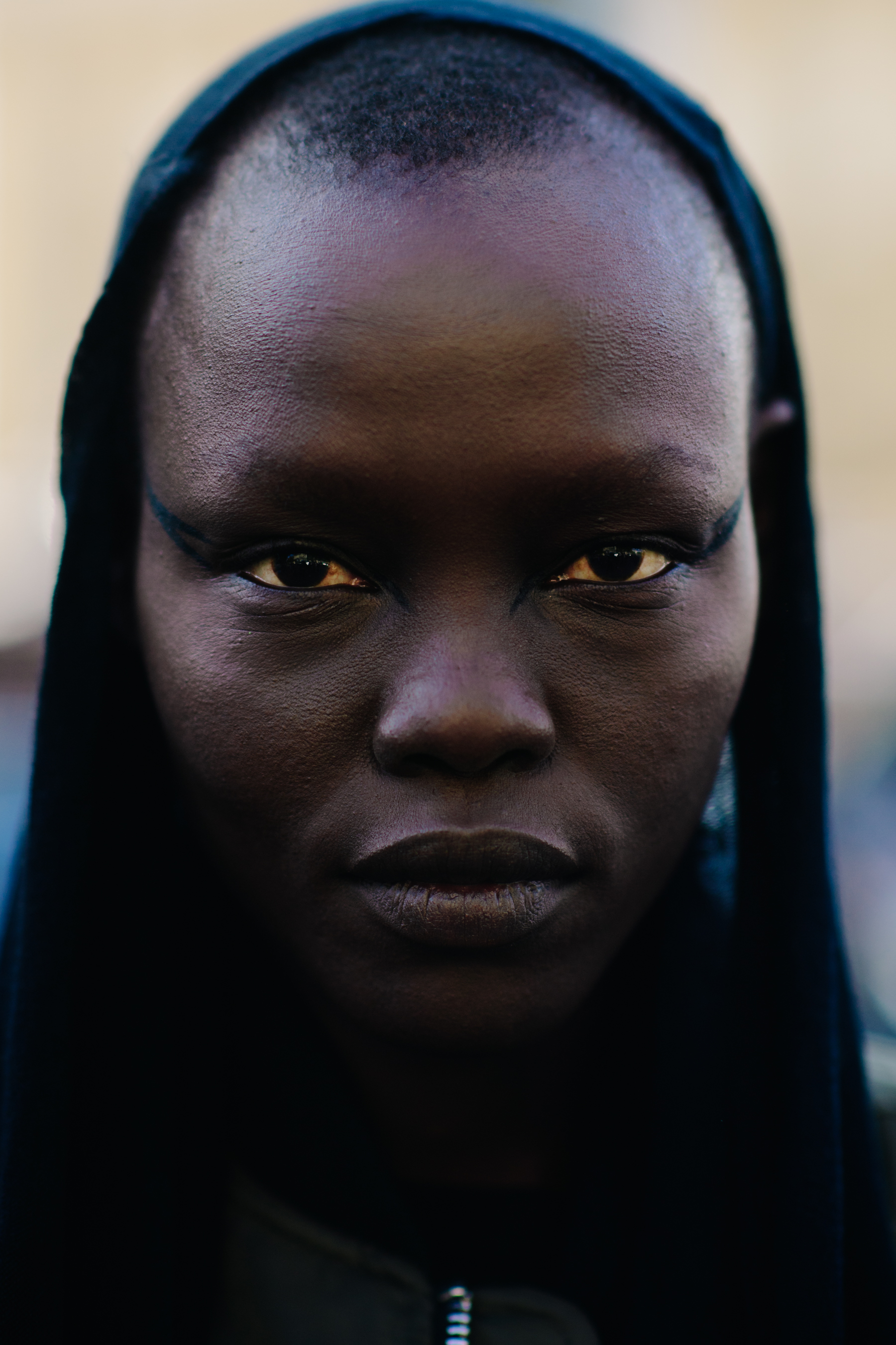 Portrait of South Sudanese model with shaved head
