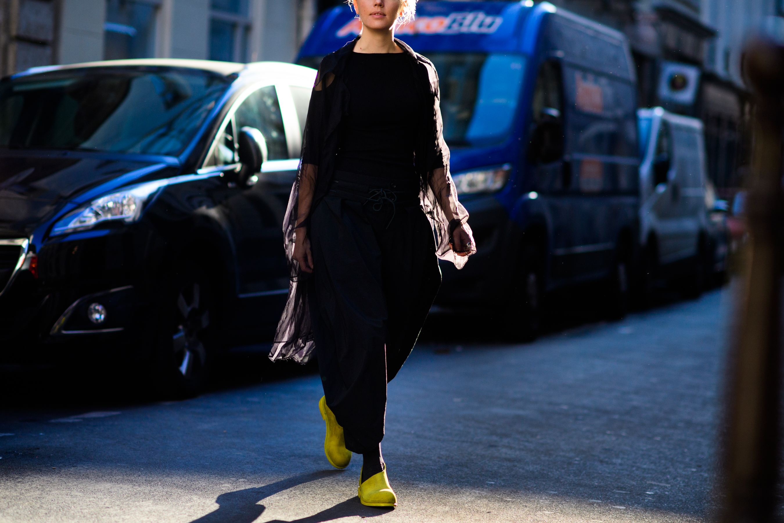 Woman walking in backlight