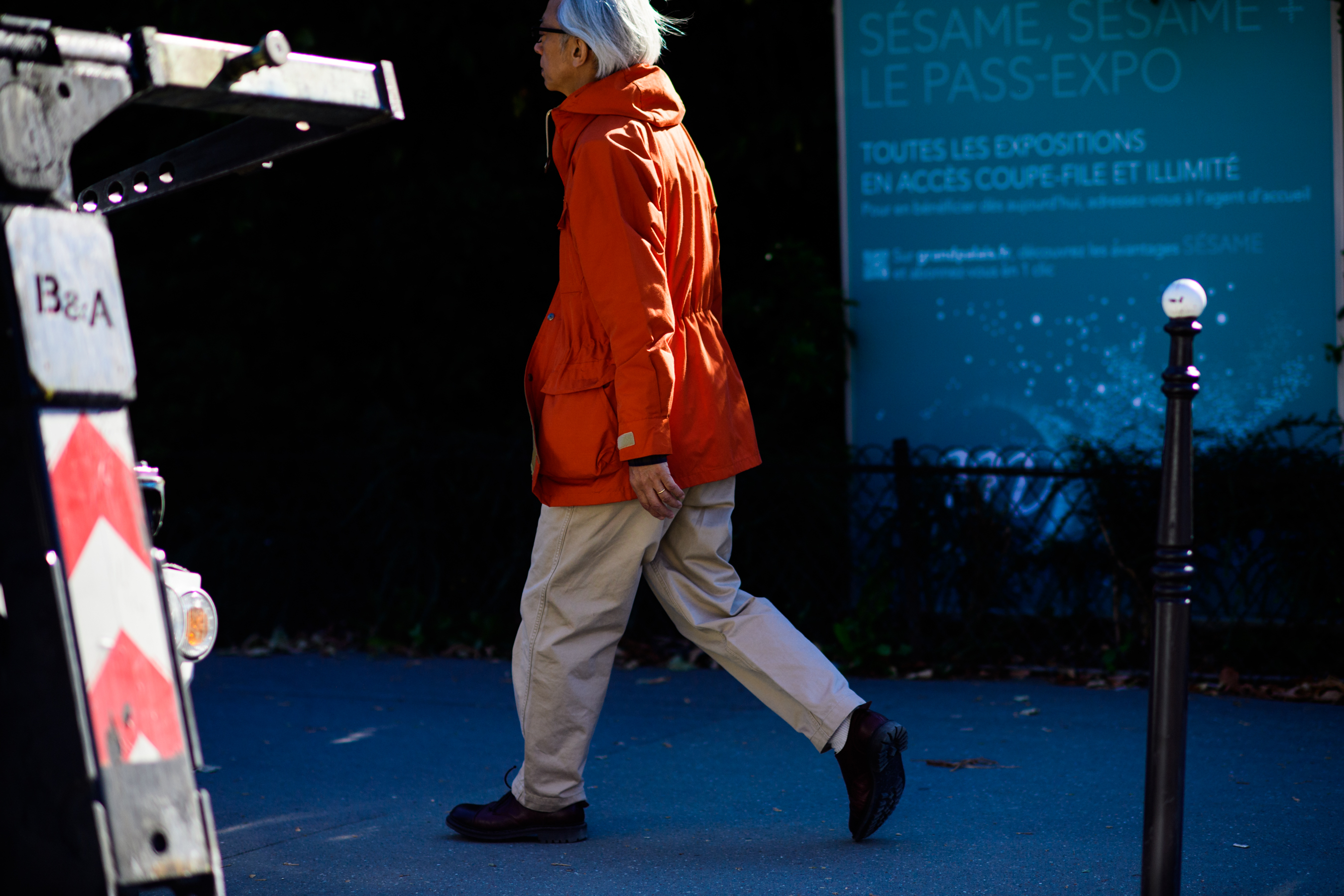 Japanese man wearing orange jacket