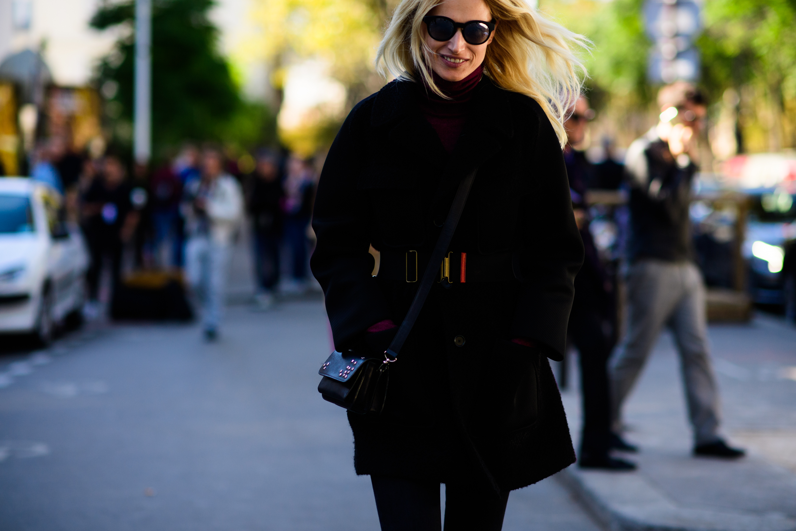 Model wearing black coat