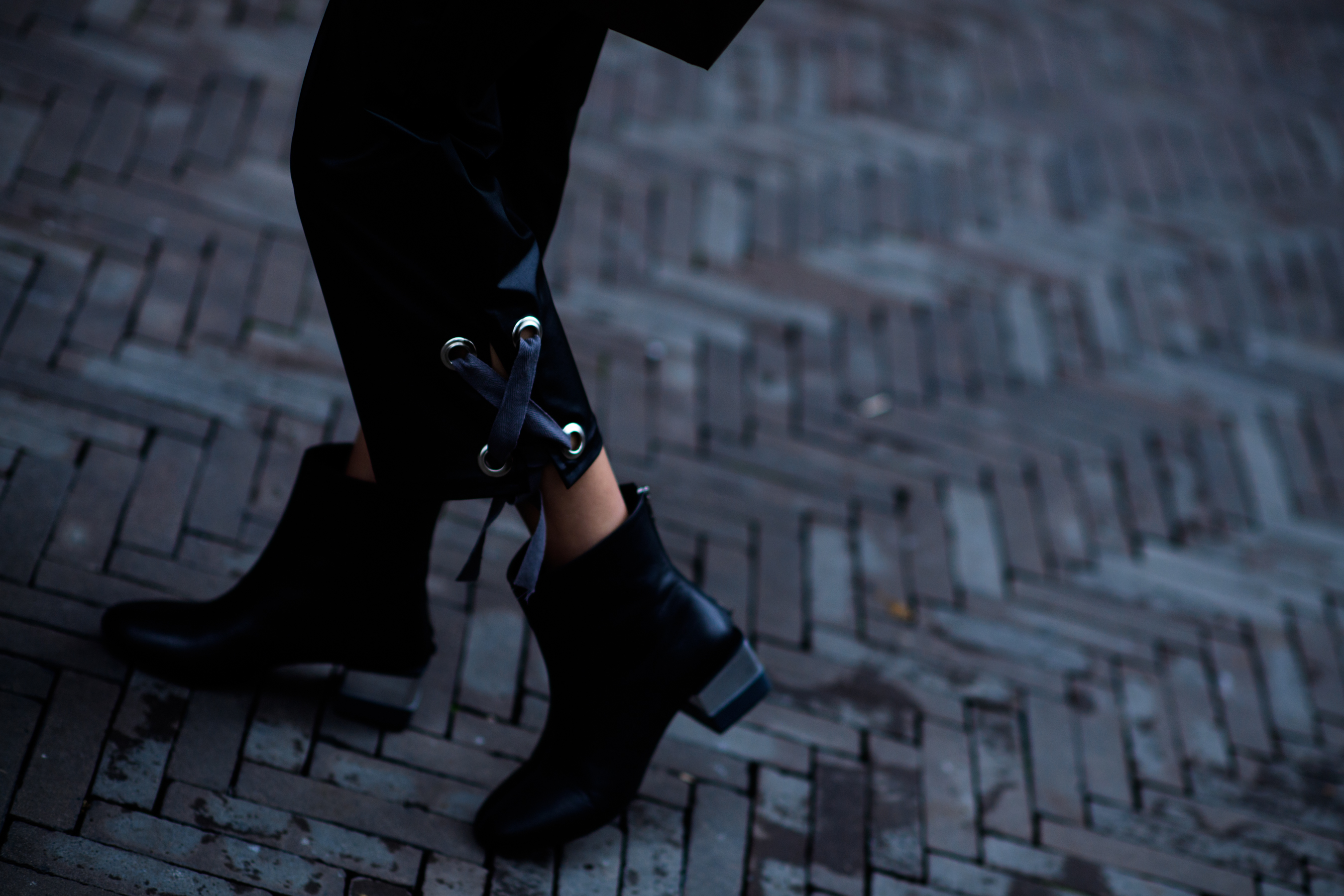 Model wearing black pants