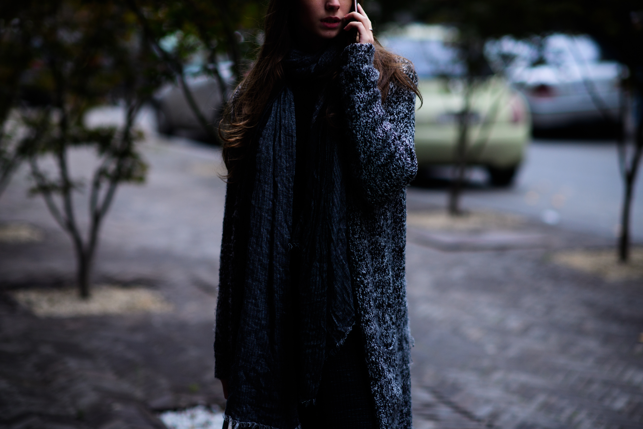Model wearing grey coat