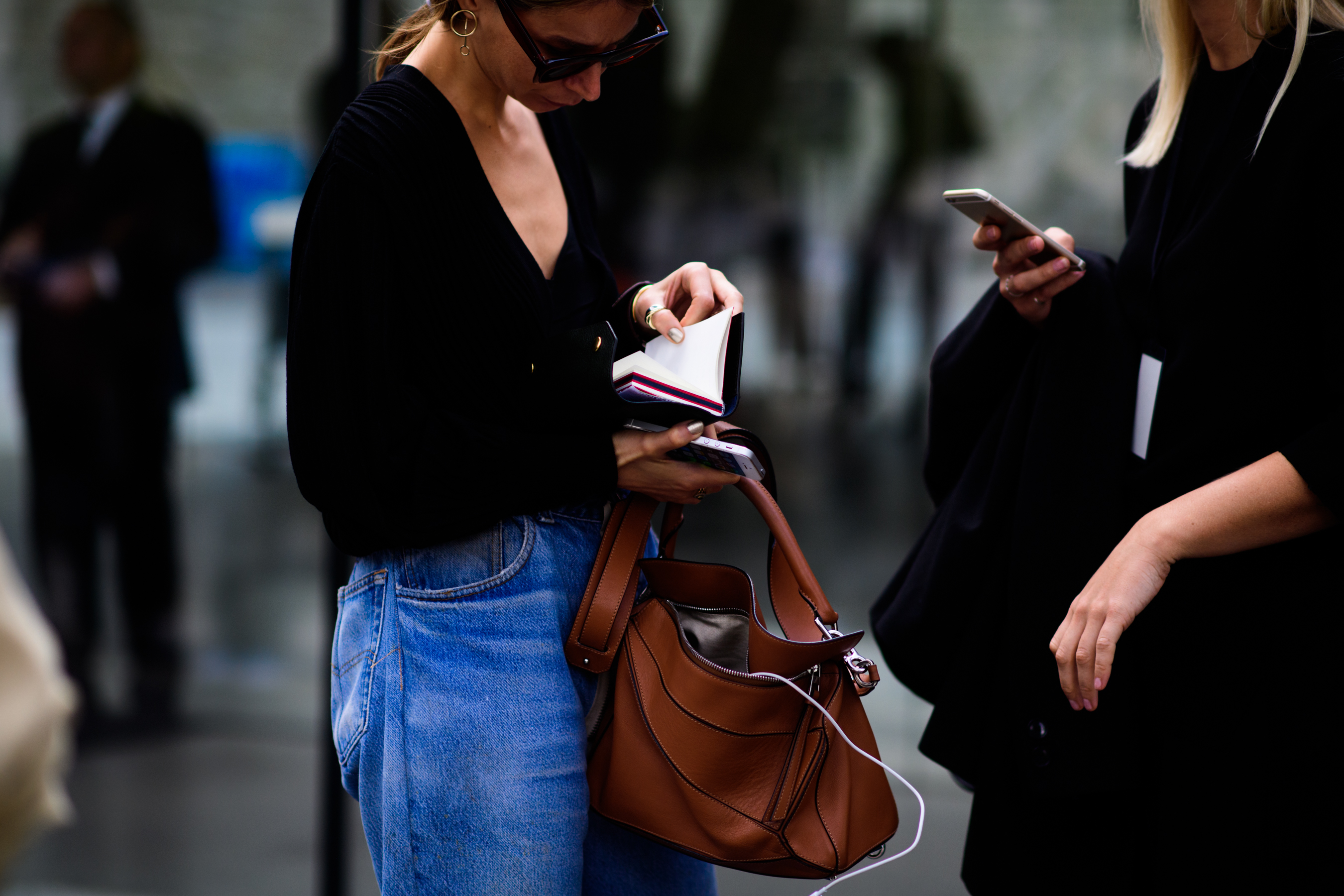 Norwegian blogger reading small notebook