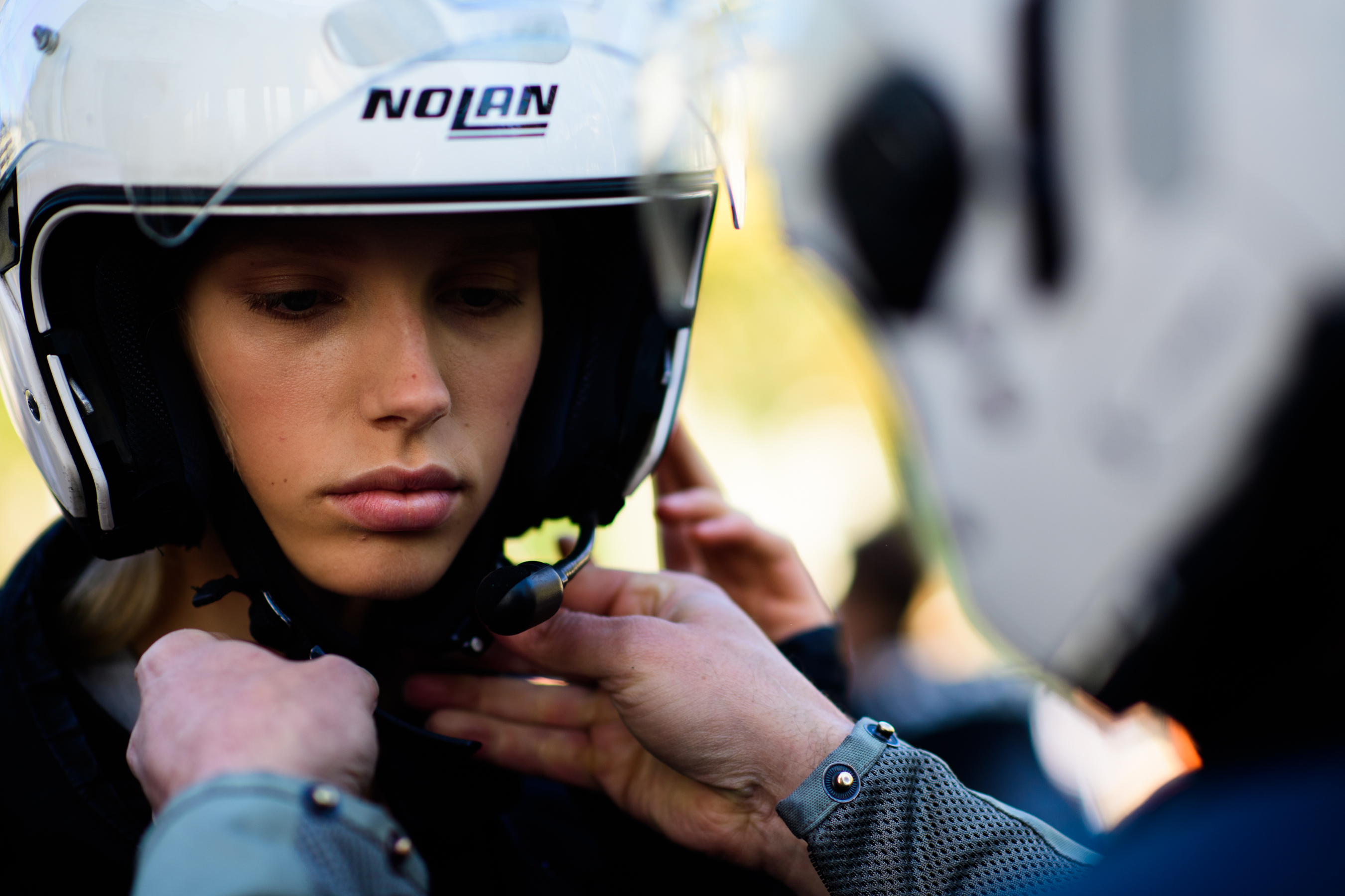 Dutch model having helmet fitted