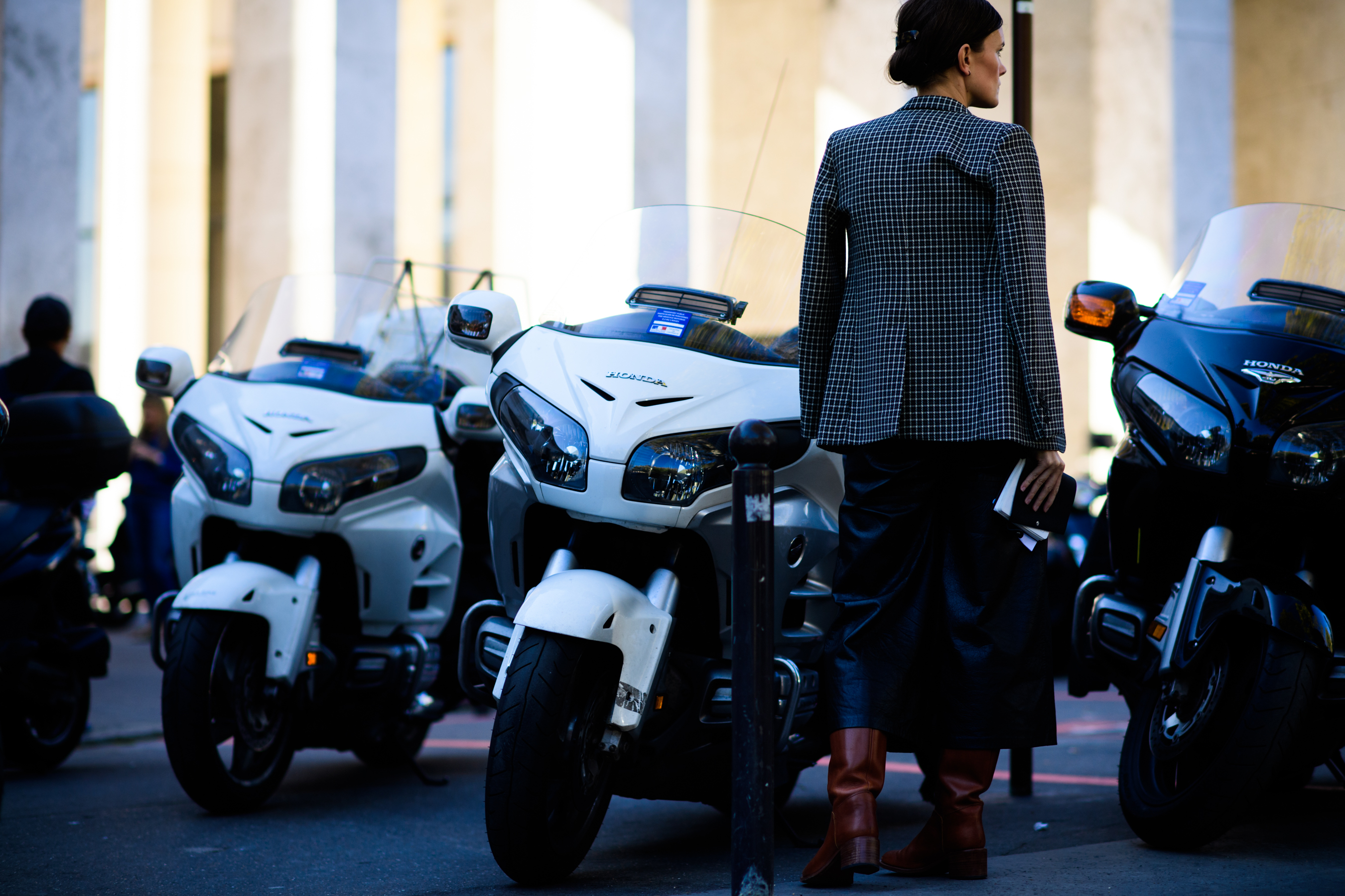 American editor stood with three motorbikes