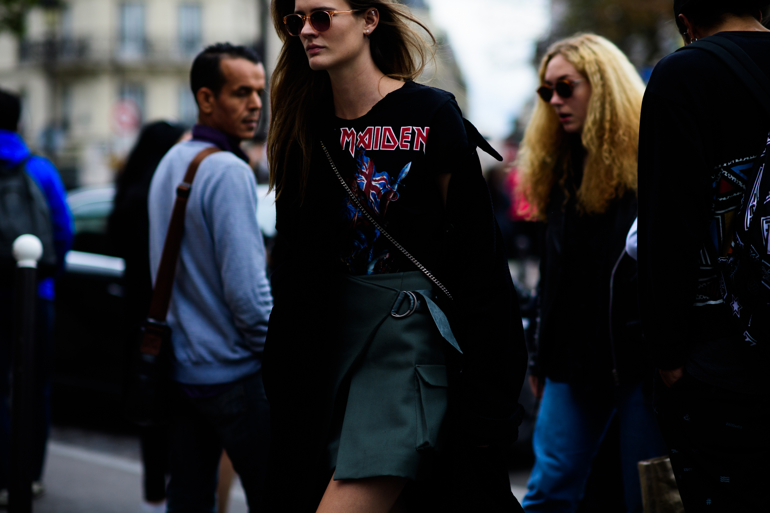 Danish woman wearing ripped band tee shirt