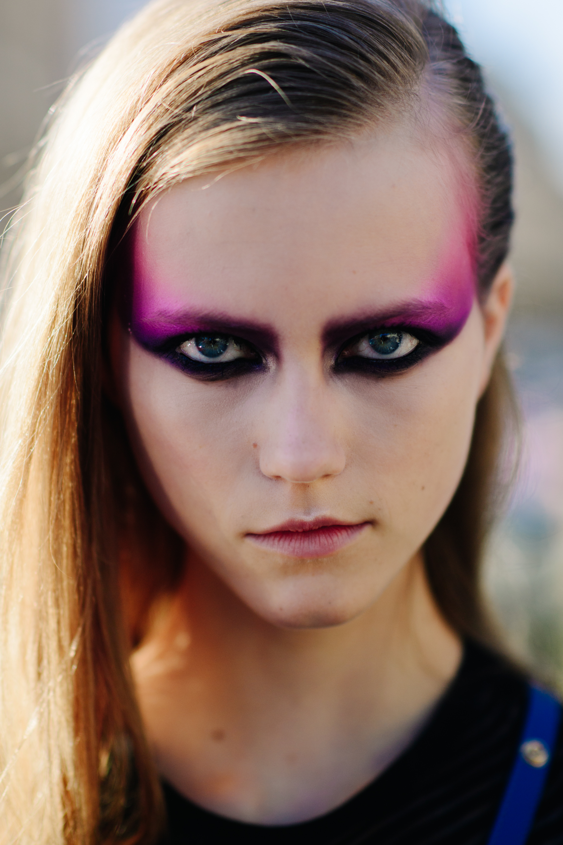 Portrait of model with pink eye makeup