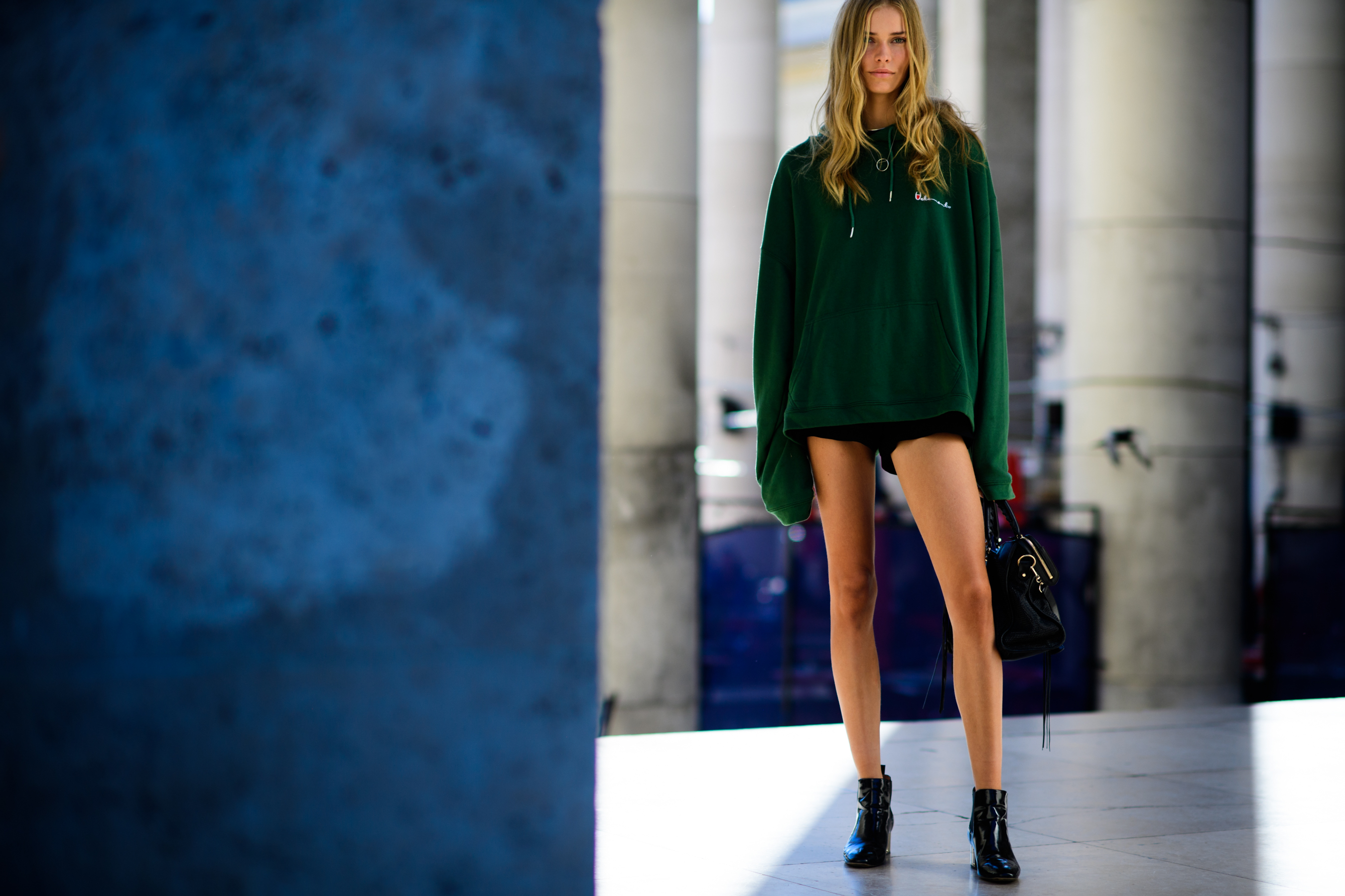 Danish model wearing green hoody