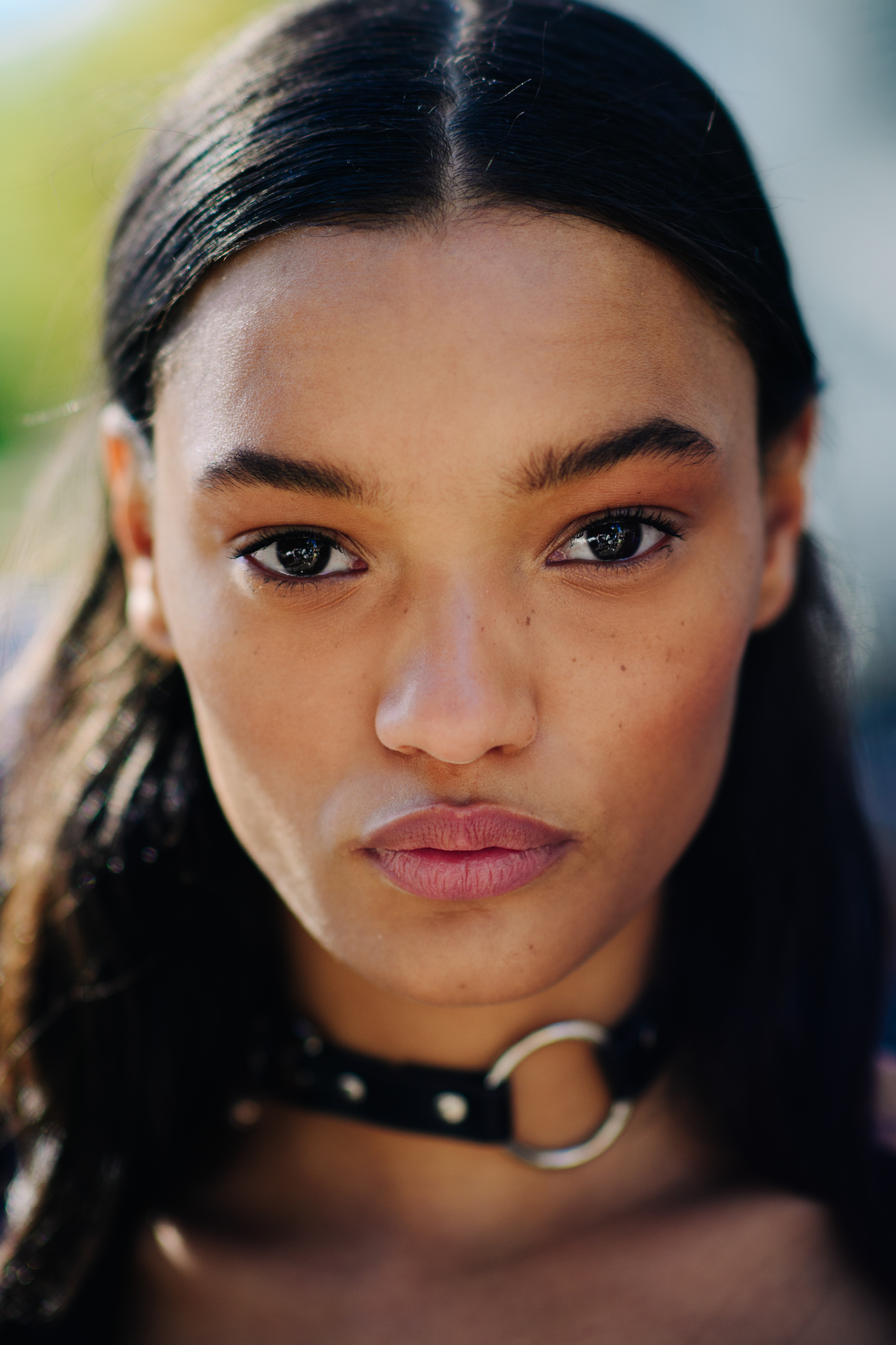 Portrait of model wearing black choker