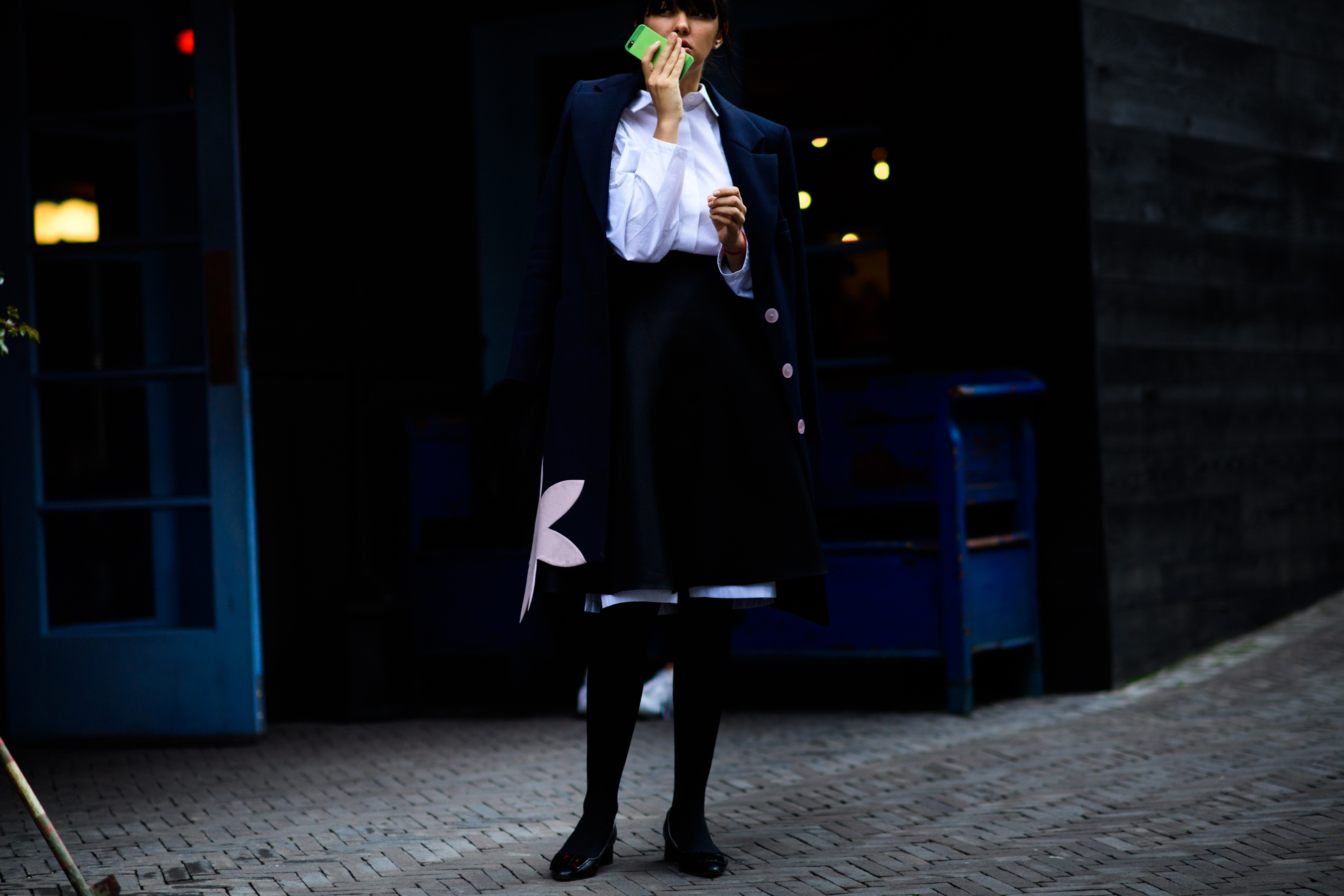 Ukrainian designer wearing dark coat