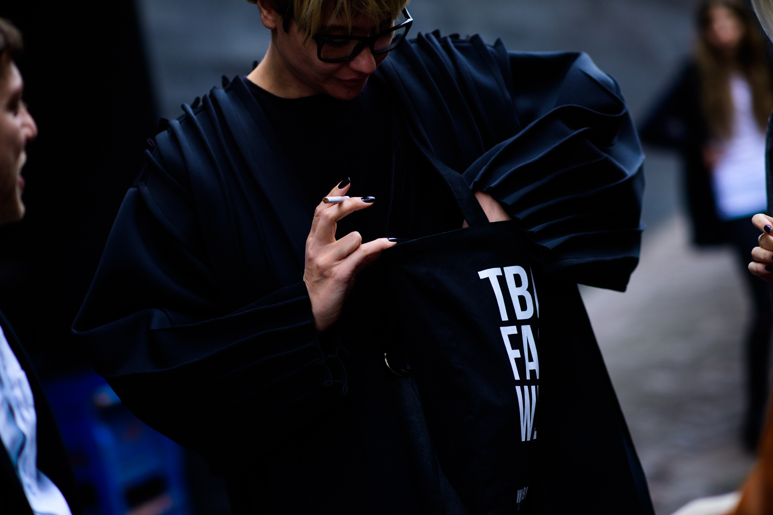 Georgian woman wearing black coat