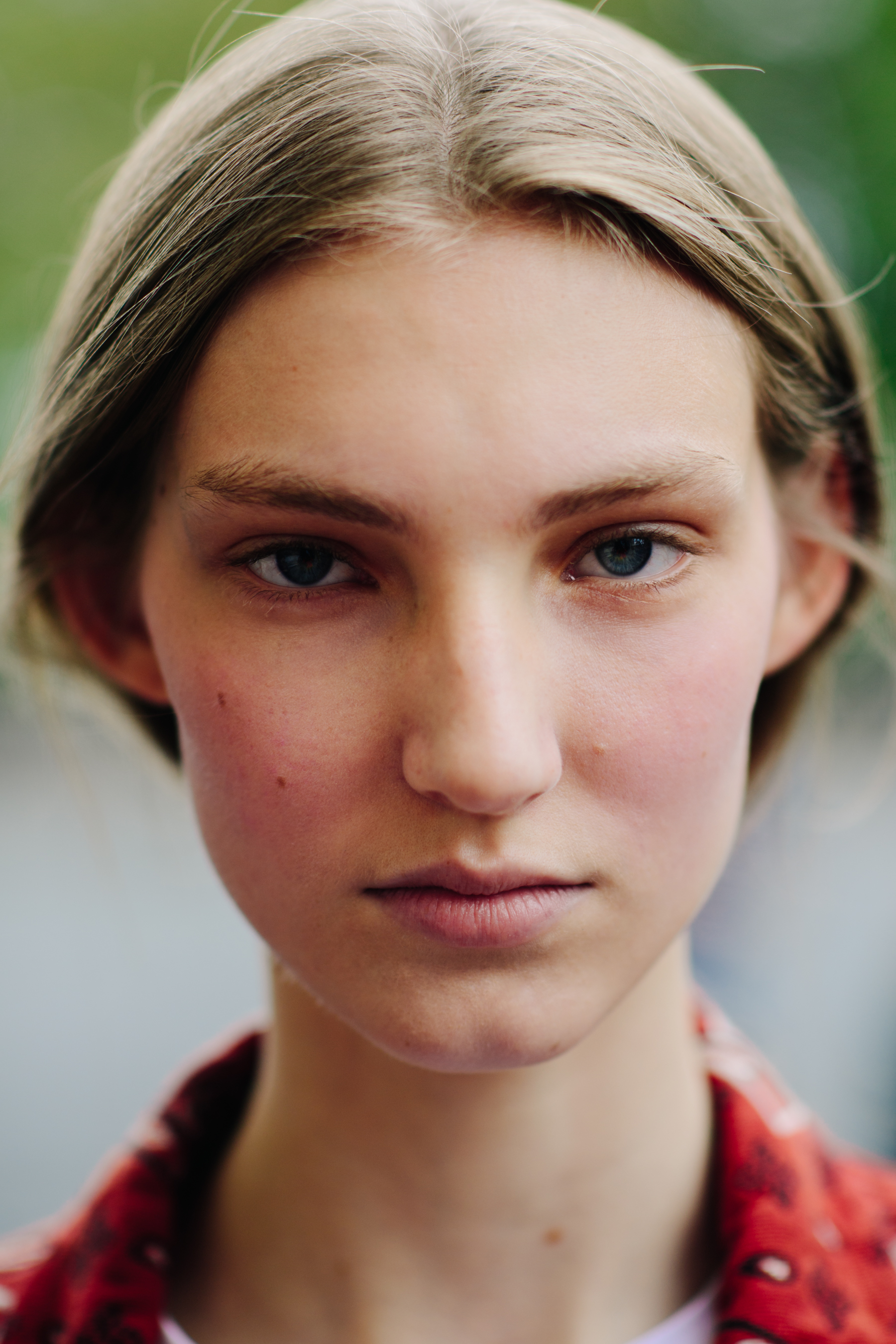 Portrait of German model with blonde hair and blue eyes