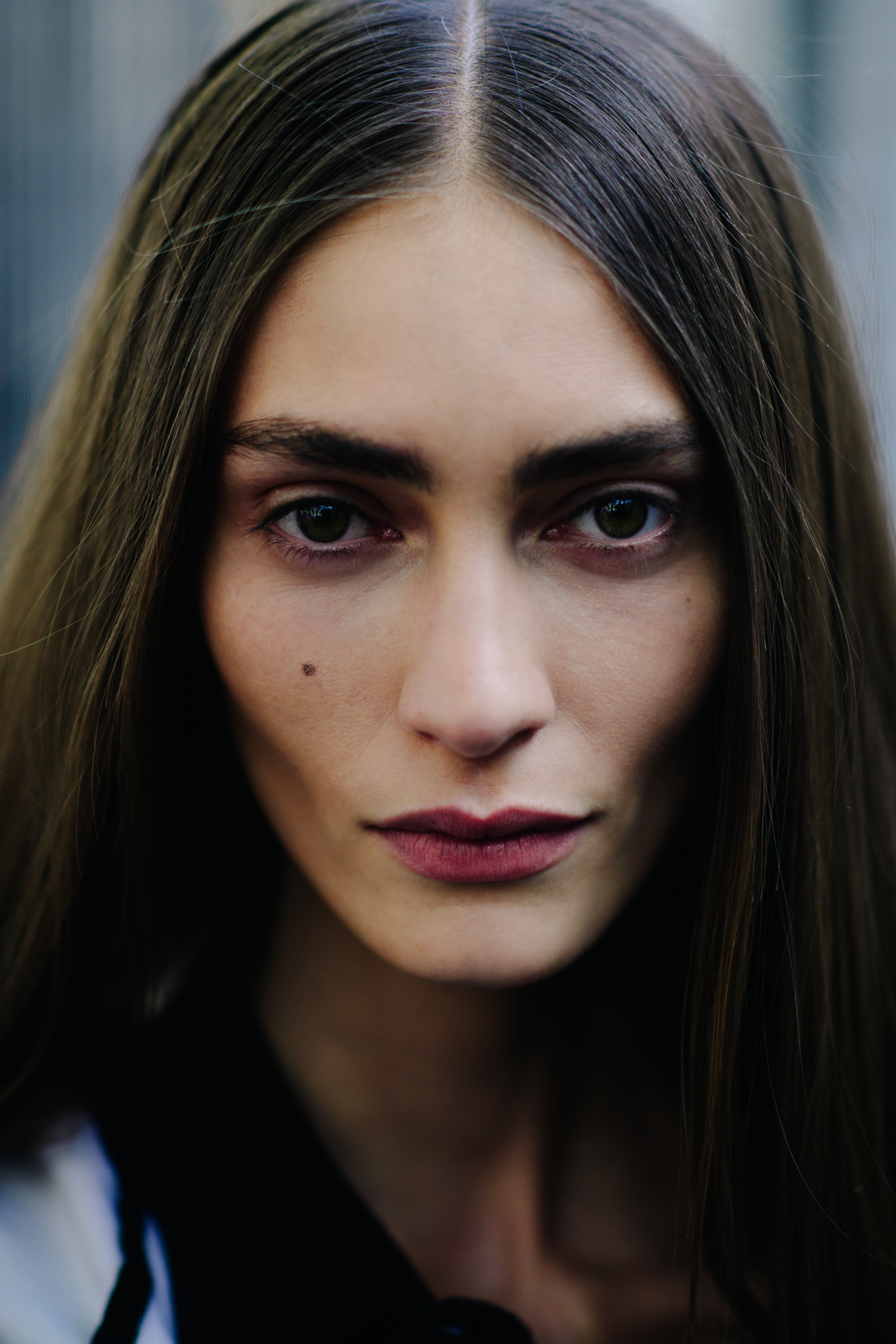 Portrait of French model with centre parted hair
