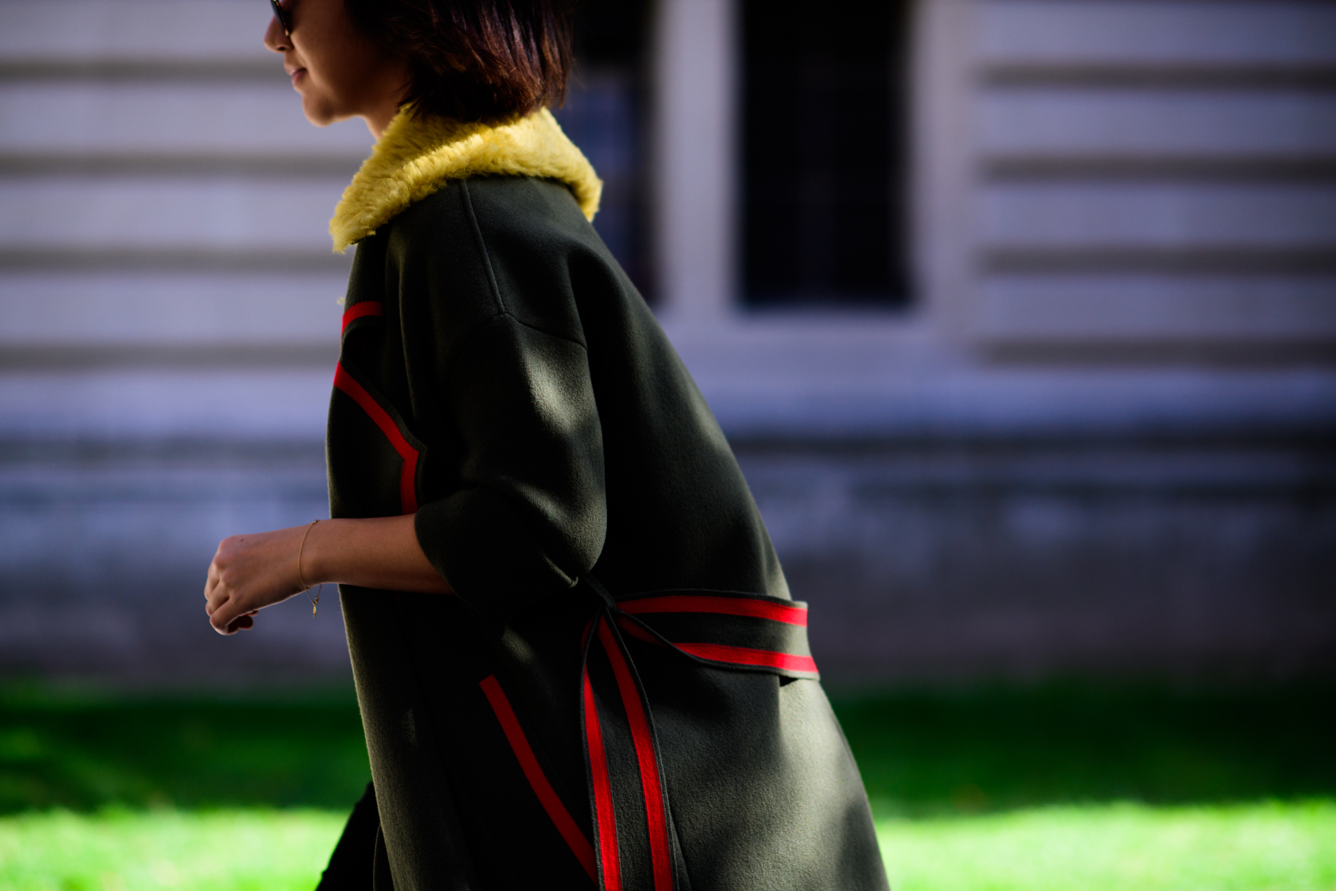 Kazakh editor wearing green coat