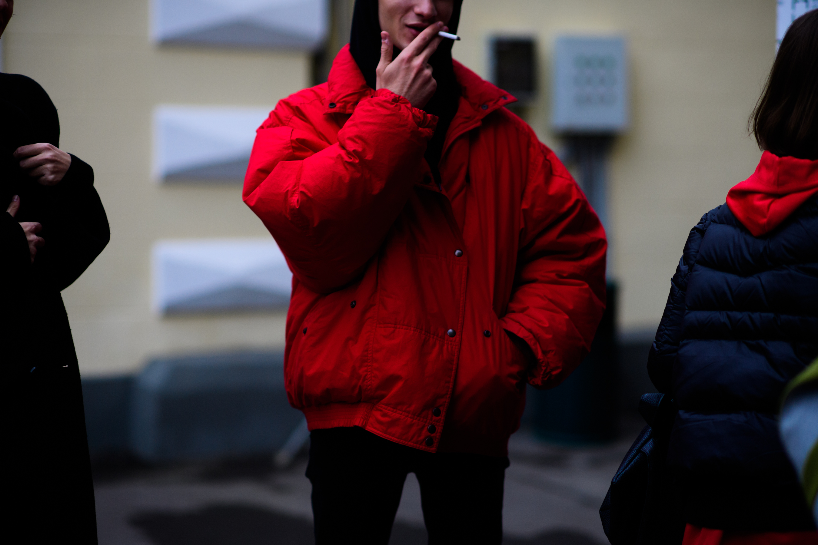 Man wearing red oversized jacket