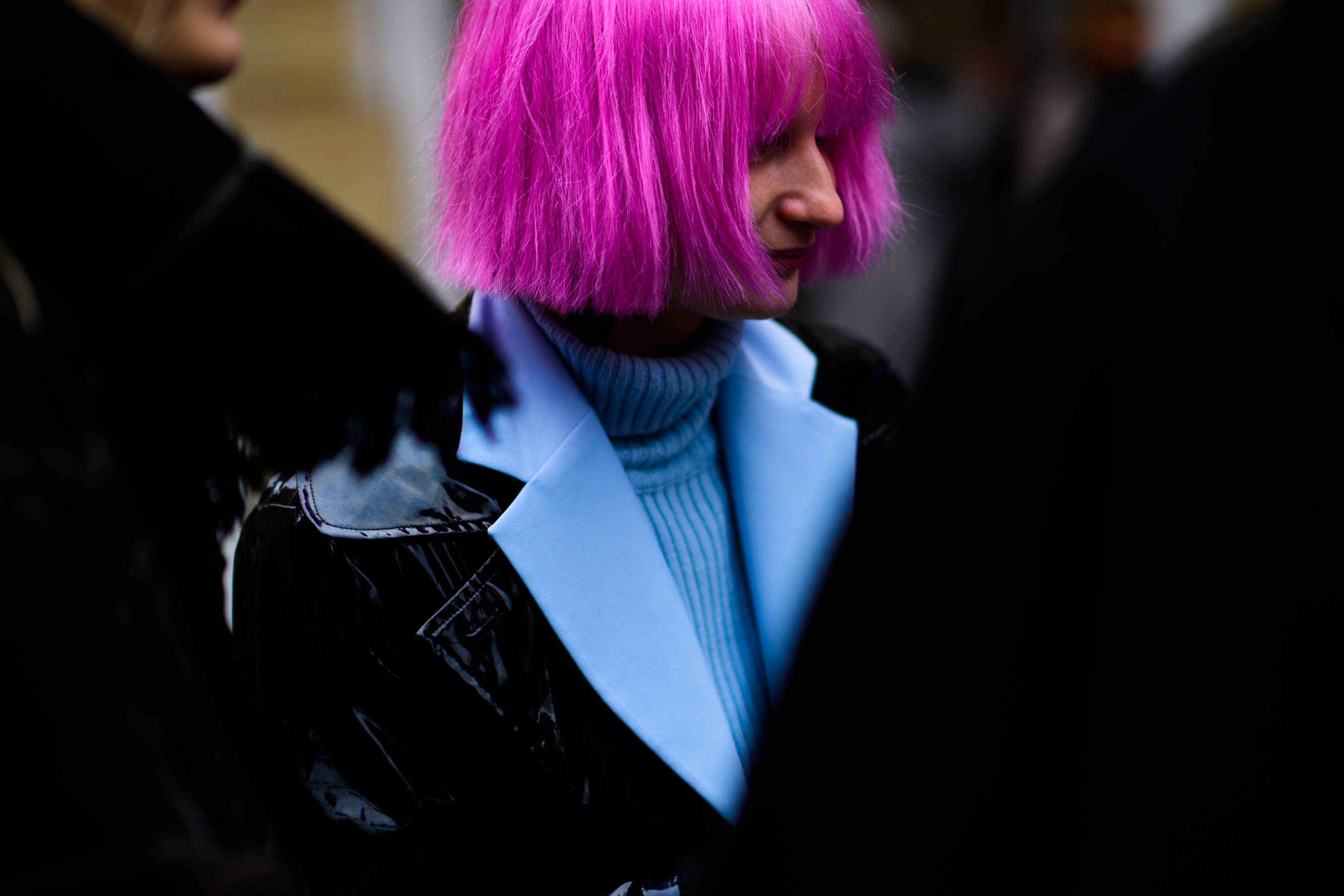 Woman with bright pink hair