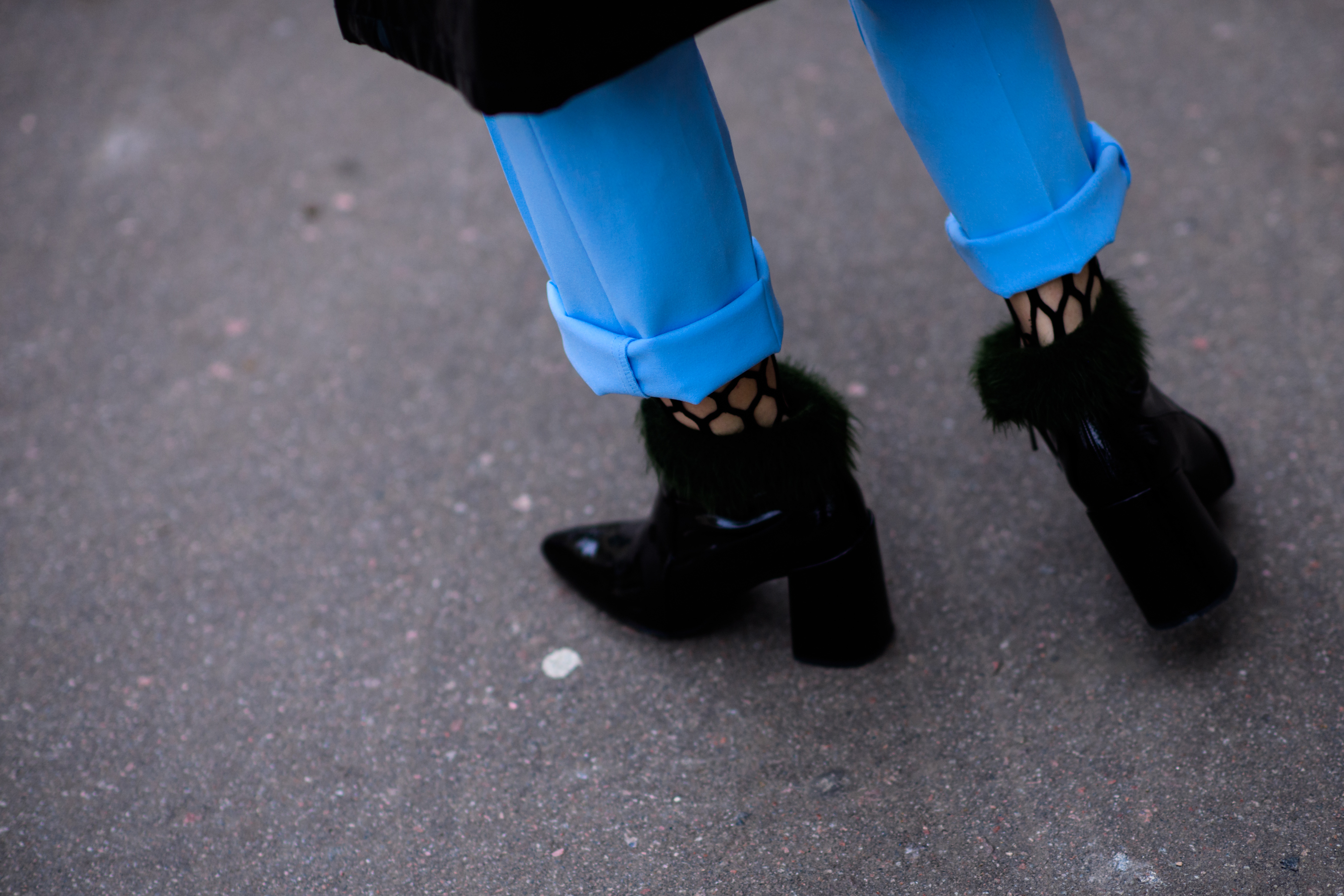 Woman wearing furry boots and denim