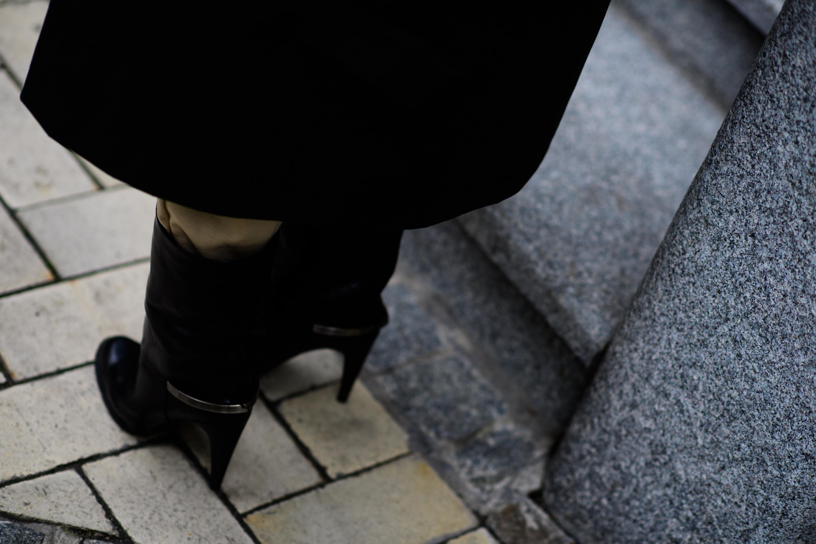 Woman wearing silver detail boots