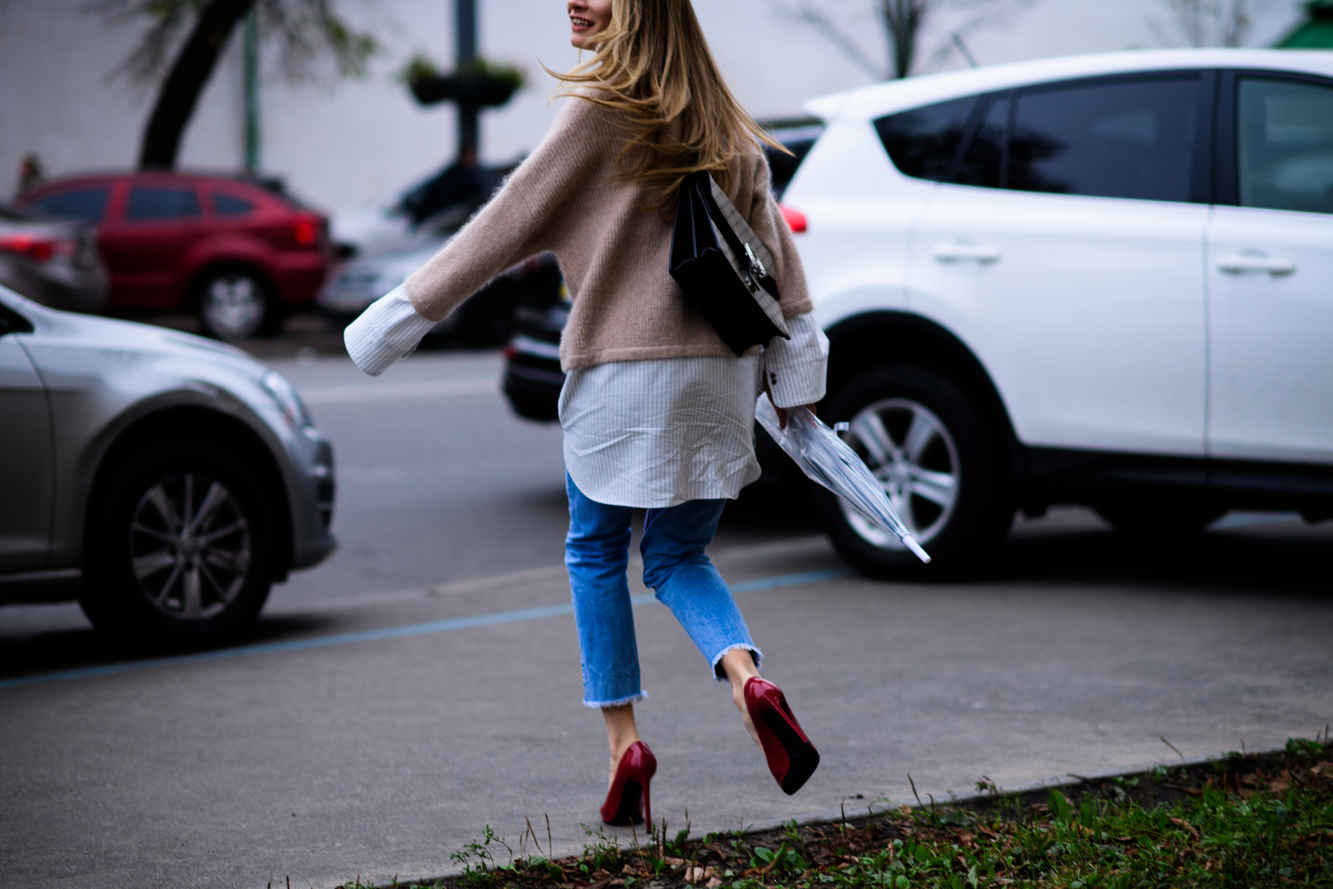 Woman wearing red stiletto shoes