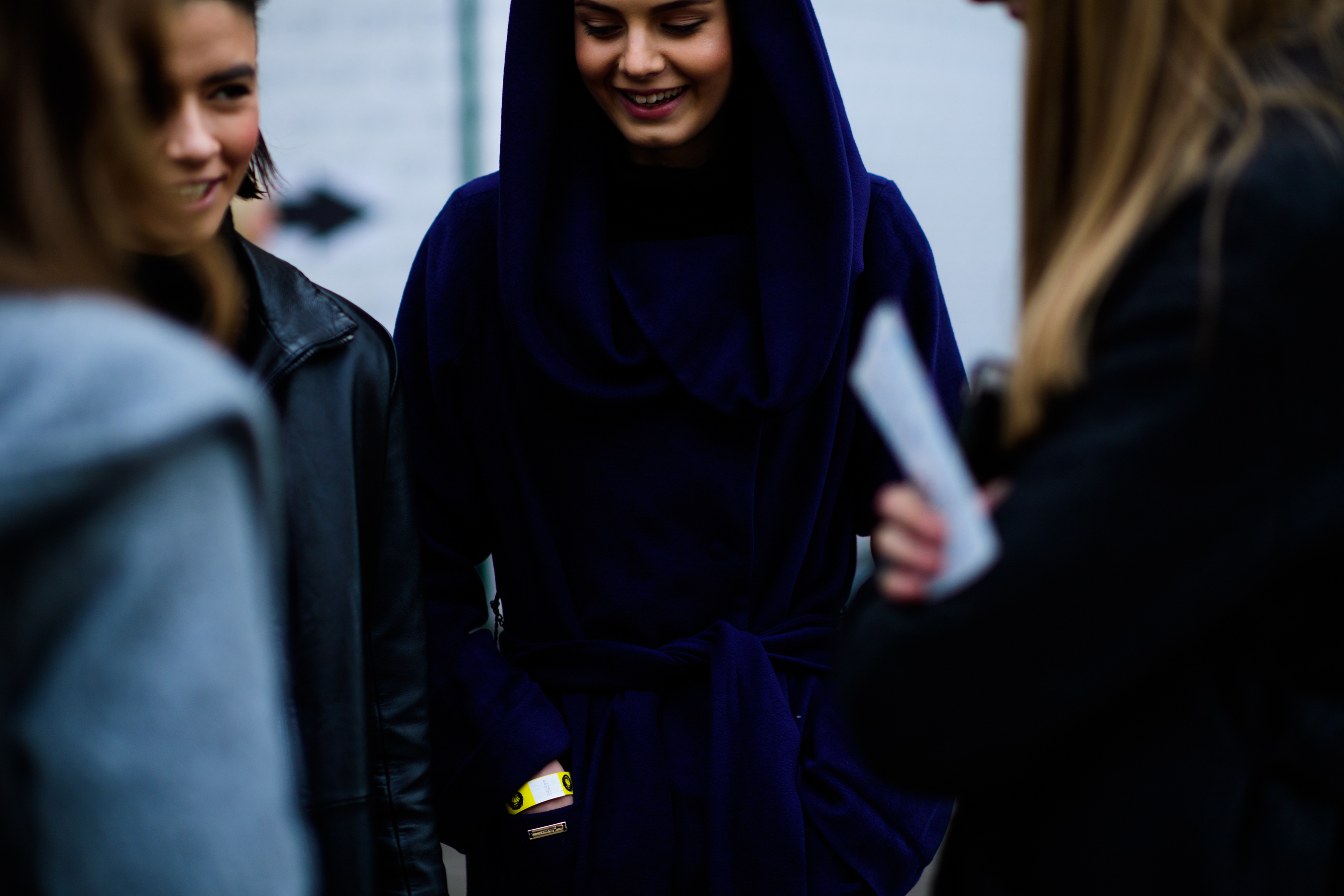 Woman wearing dark blue coat