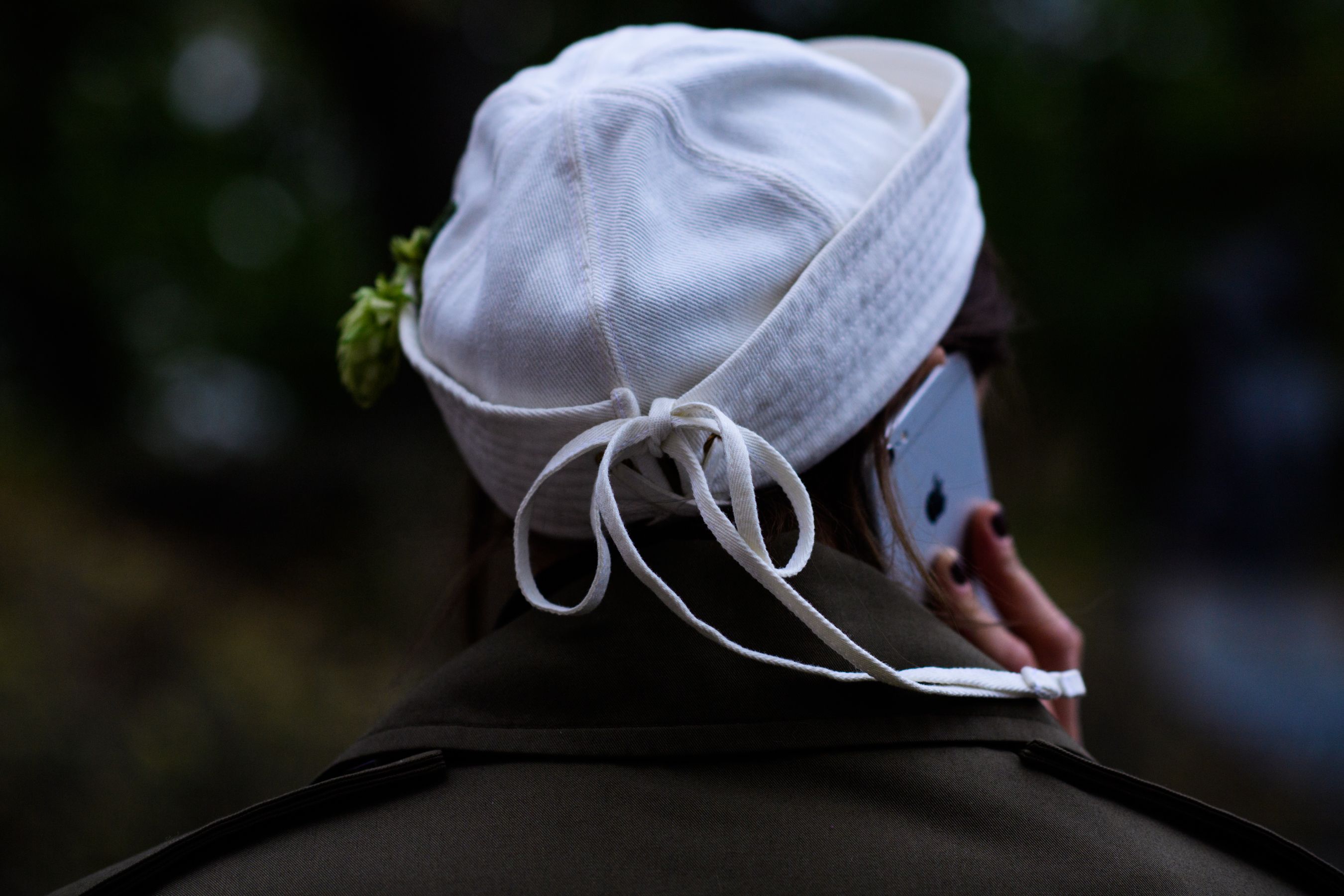 Ukrainian stylist wearing white hat