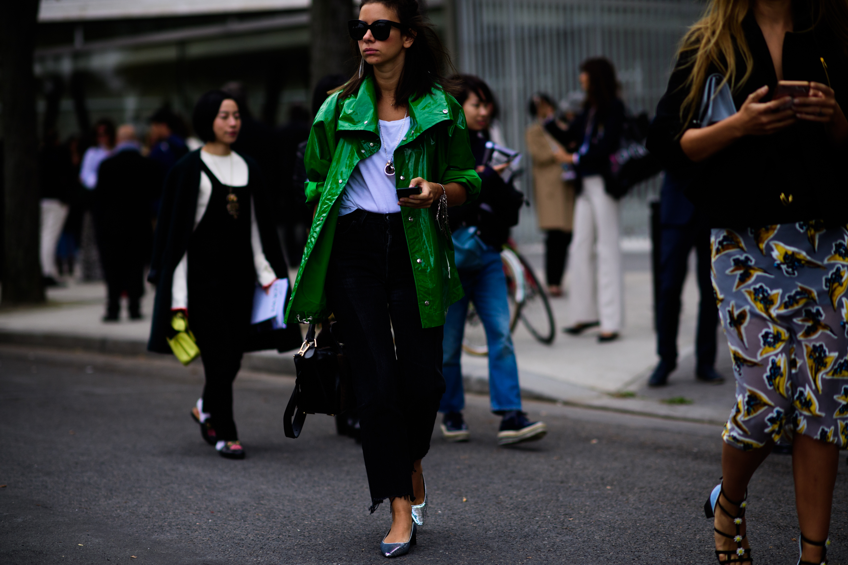 Russian buyer wearing green raincoat