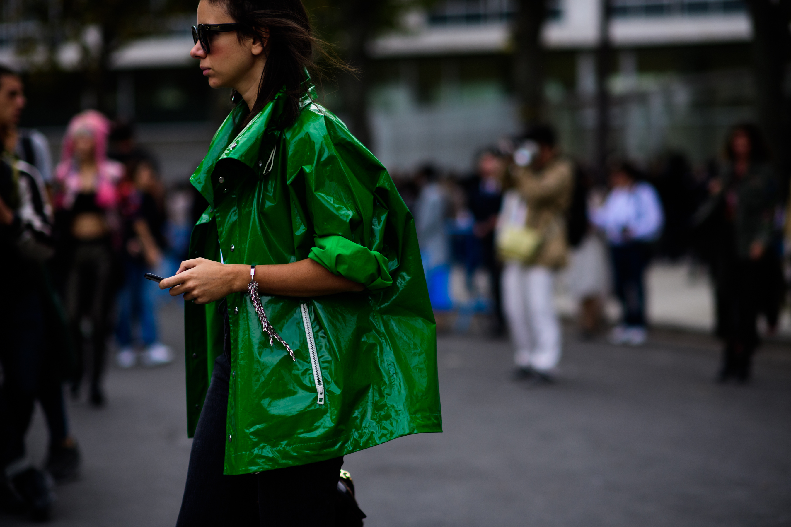 Russian buyer wearing green raincoat